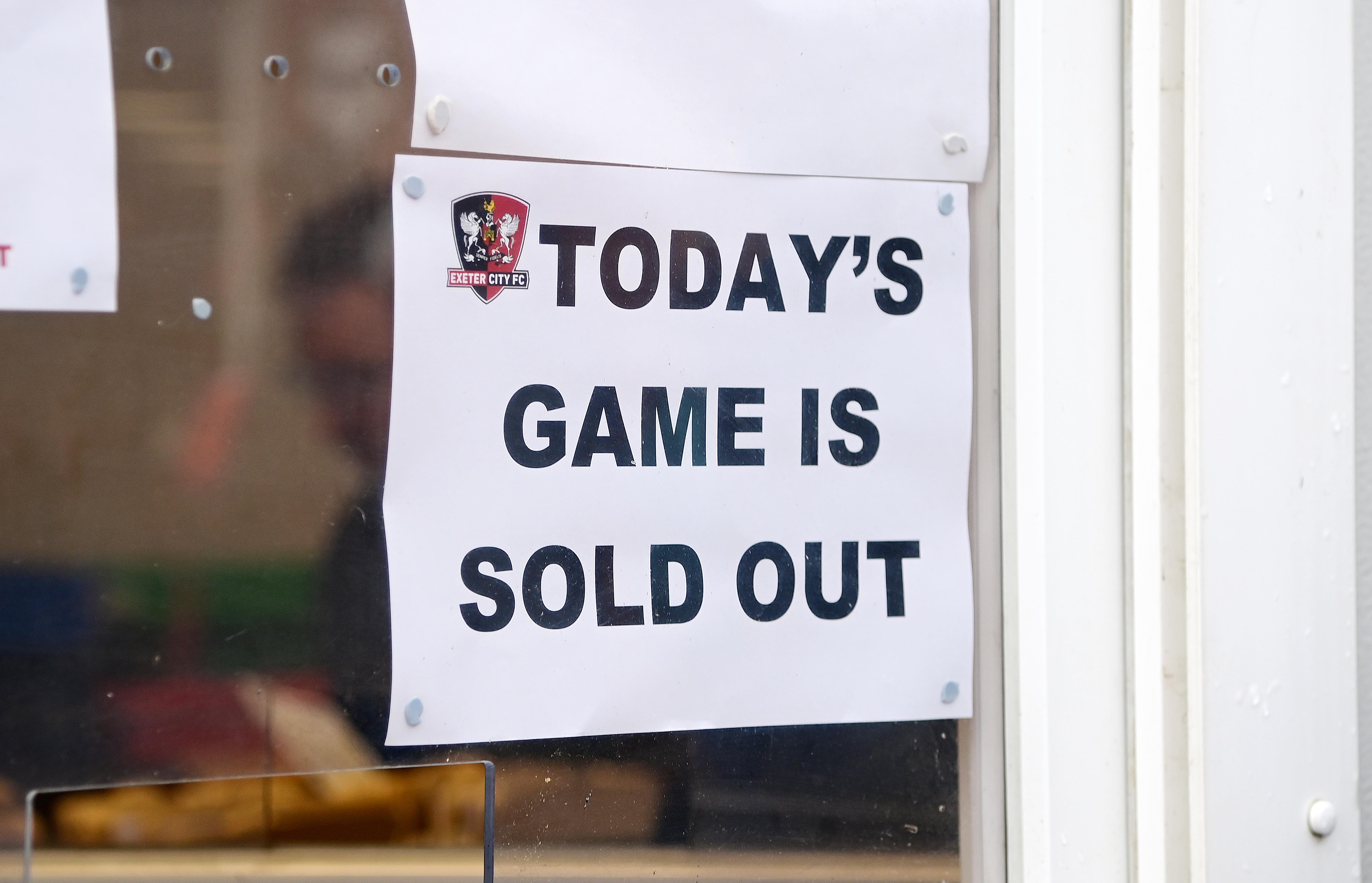 Sign showing tickets sold out for Exeter City match