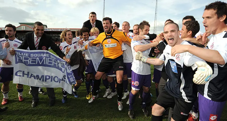 Crawley Town celebrating promotion in 2011