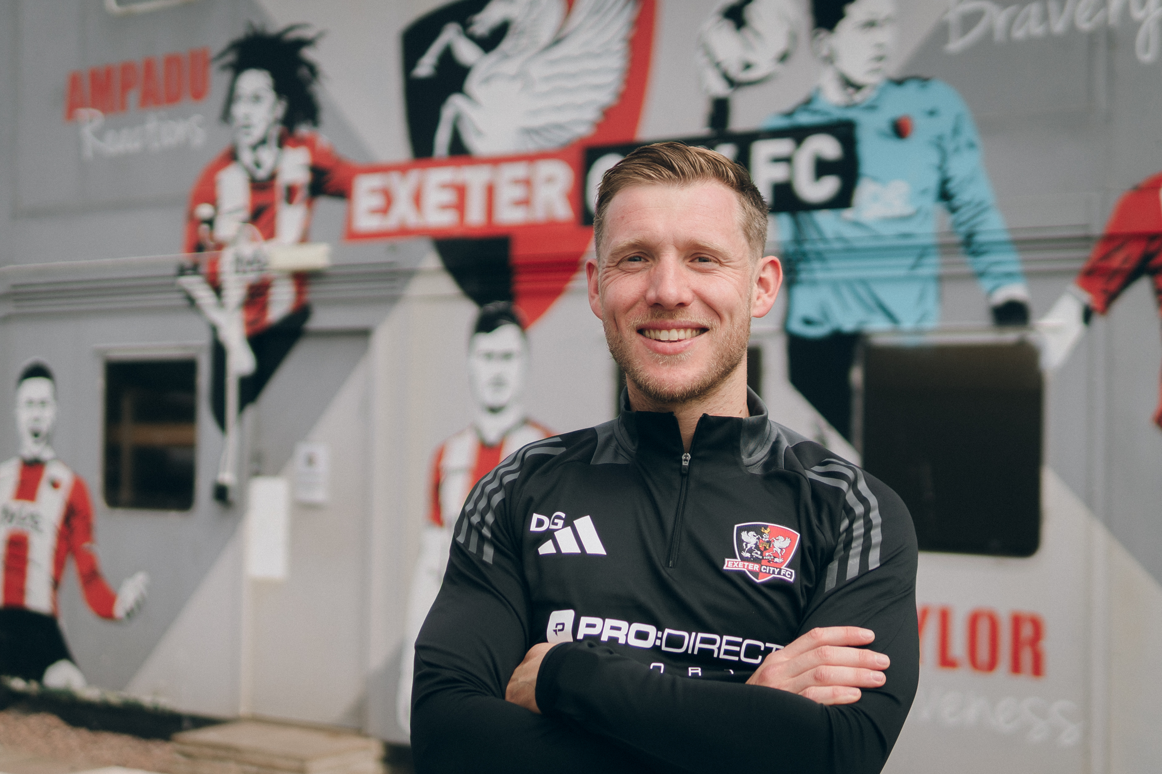 Dan Green stood in front of the ECFC academy building with his arms crossed