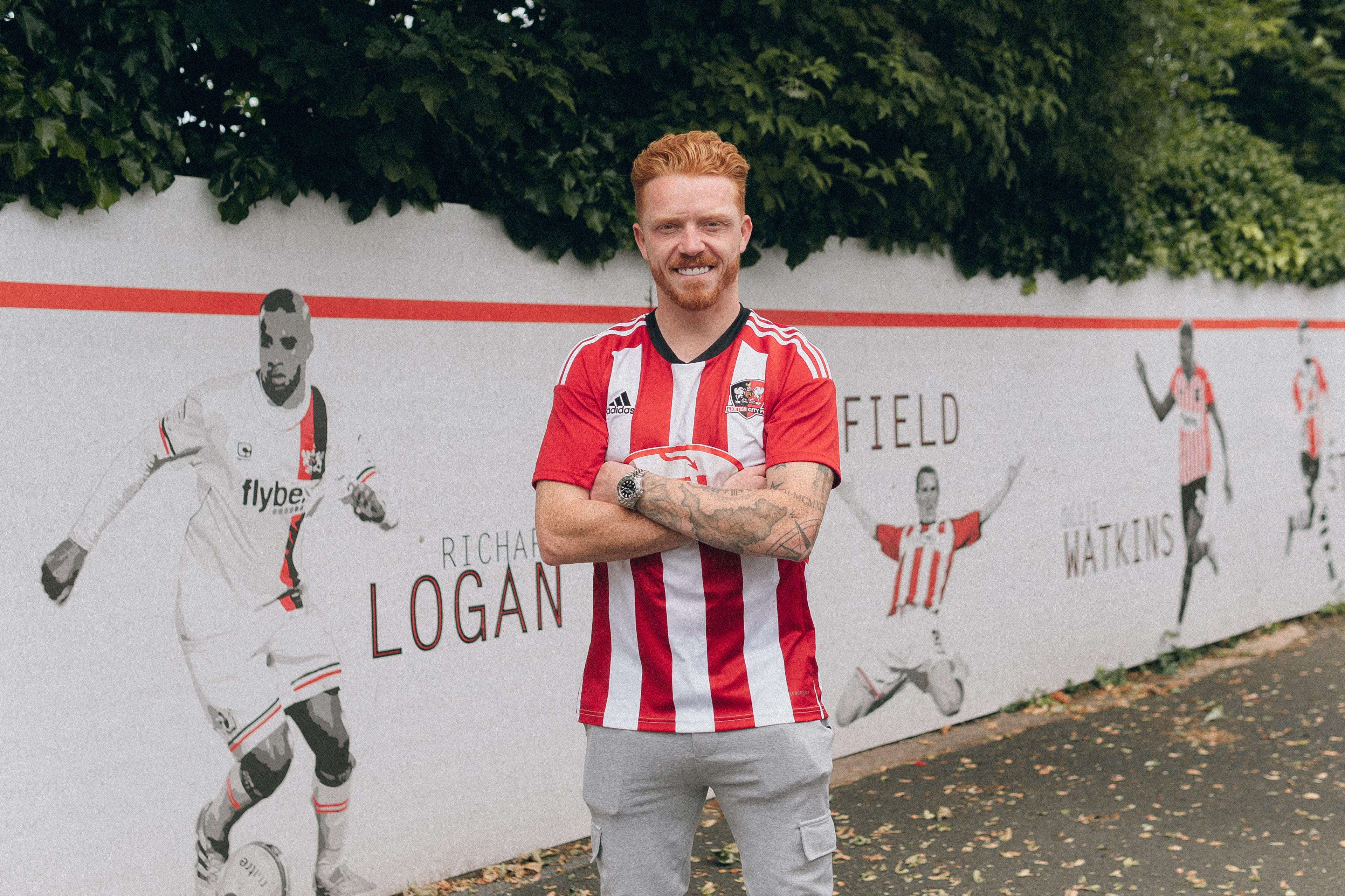 Ryan Woods in front of the ecfc strikers wall