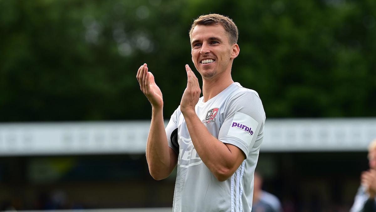 Tom Carroll clapping the Exeter supporters