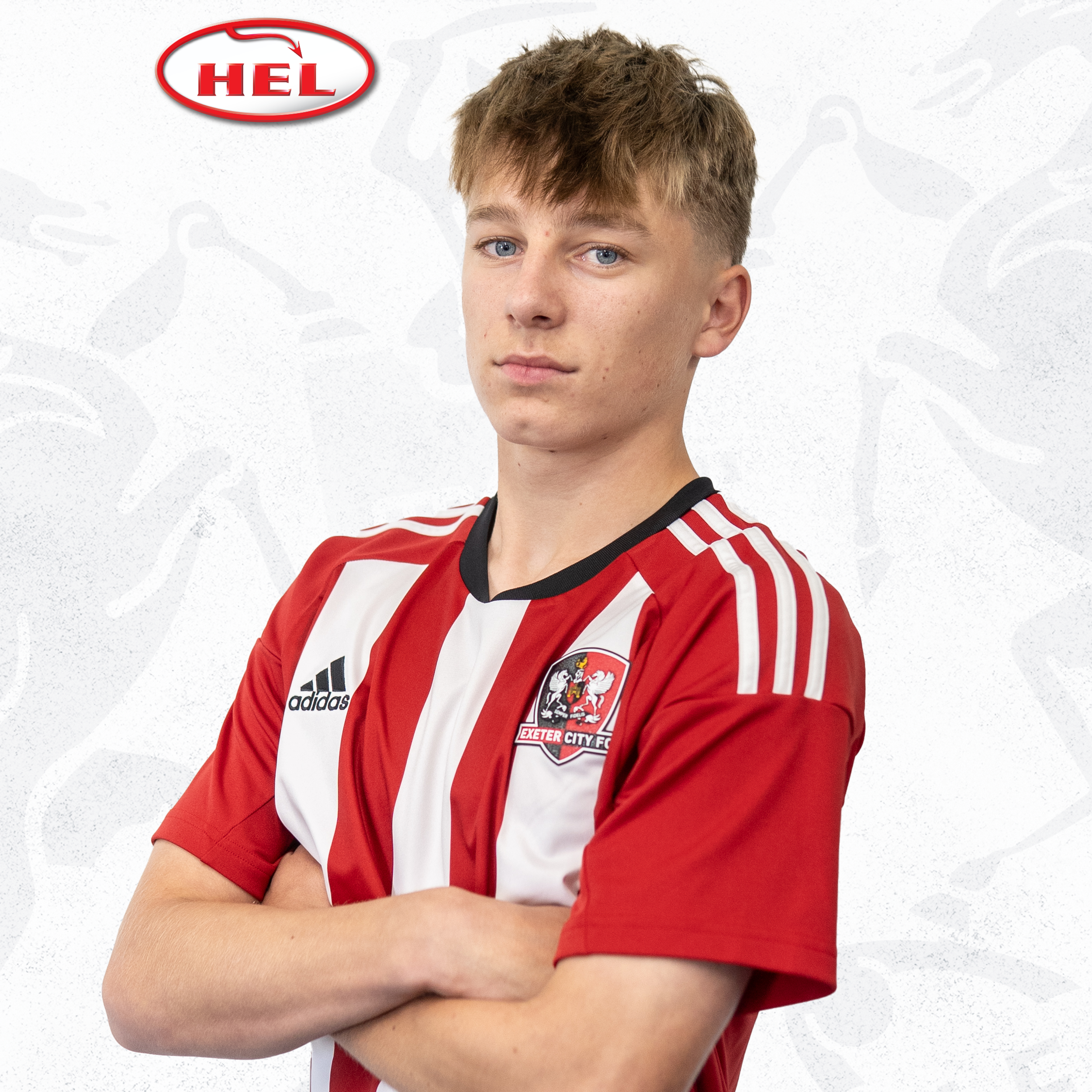 Under-18s player profile picture of George Birch. He's got his arms crossed over his red and white home shirt and is standing side on, looking at the camera. The HEL logo is in the corner.