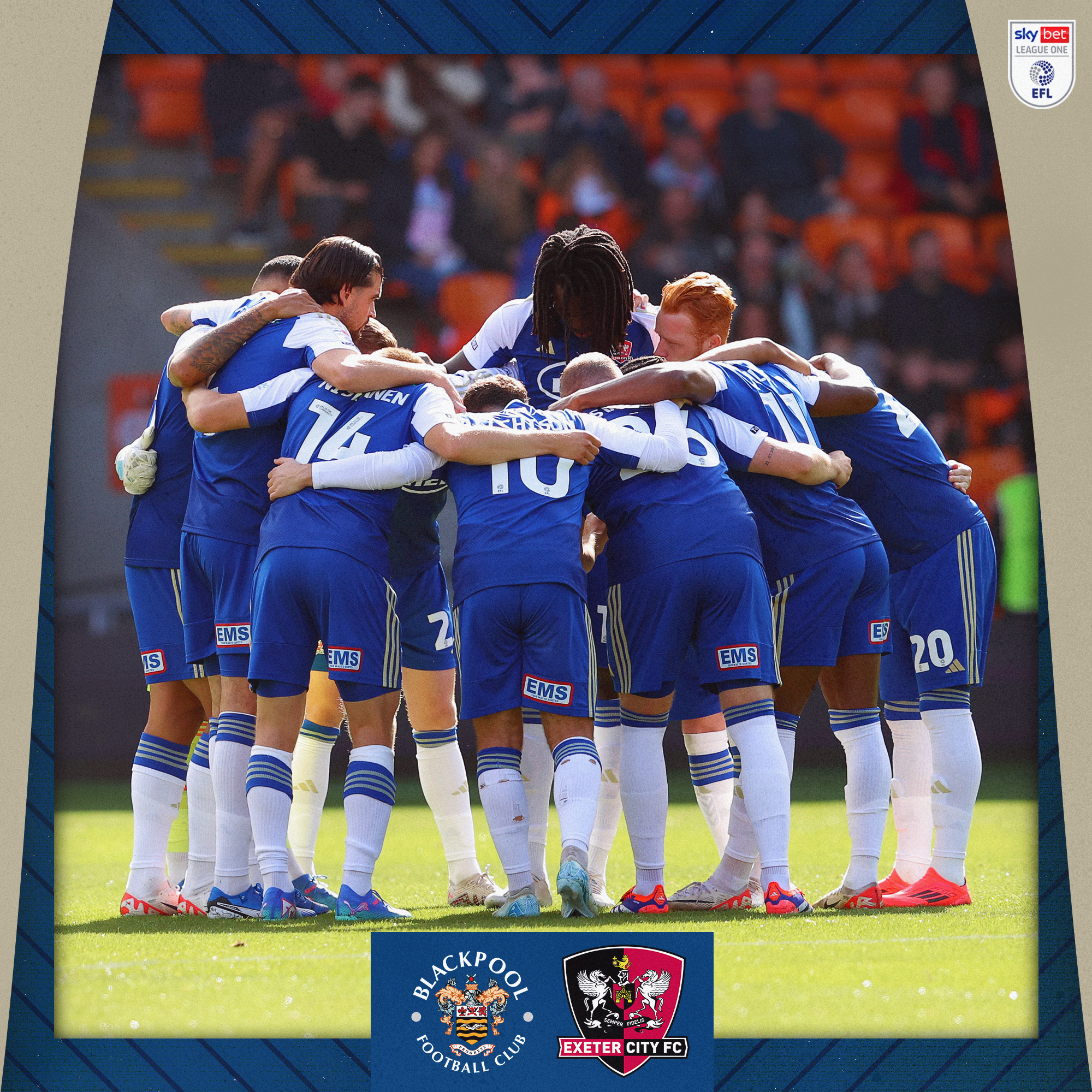 Exeter City team in a pre-match huddle on the pitch at Blackpool, they're in their blue kit, arms linked and heads down.