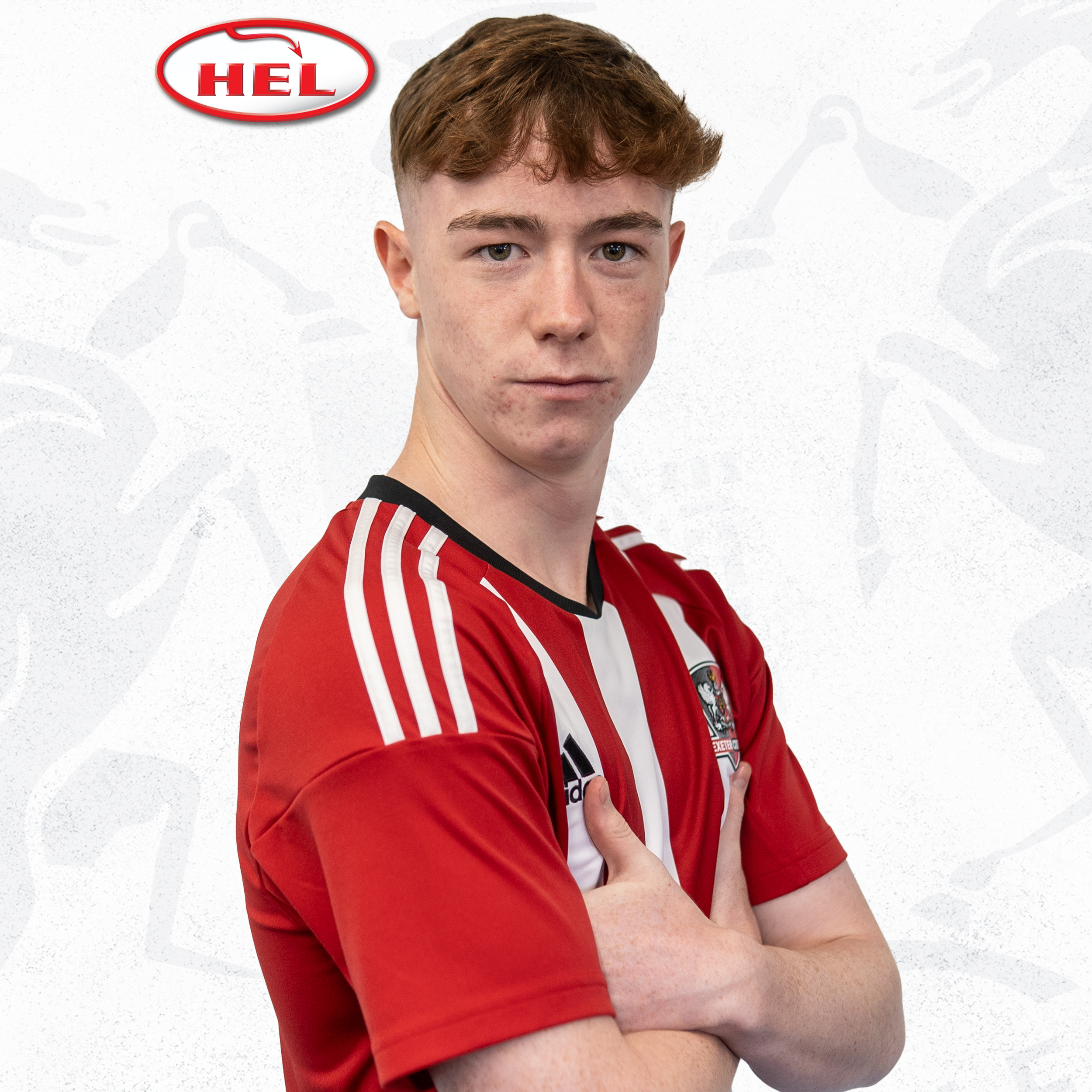 Profile picture for Jude Horn. He's got short red hair in a fringe, and has his arms folded while he stands side on, looking at the camera. The HEL logo is in the top corner. 