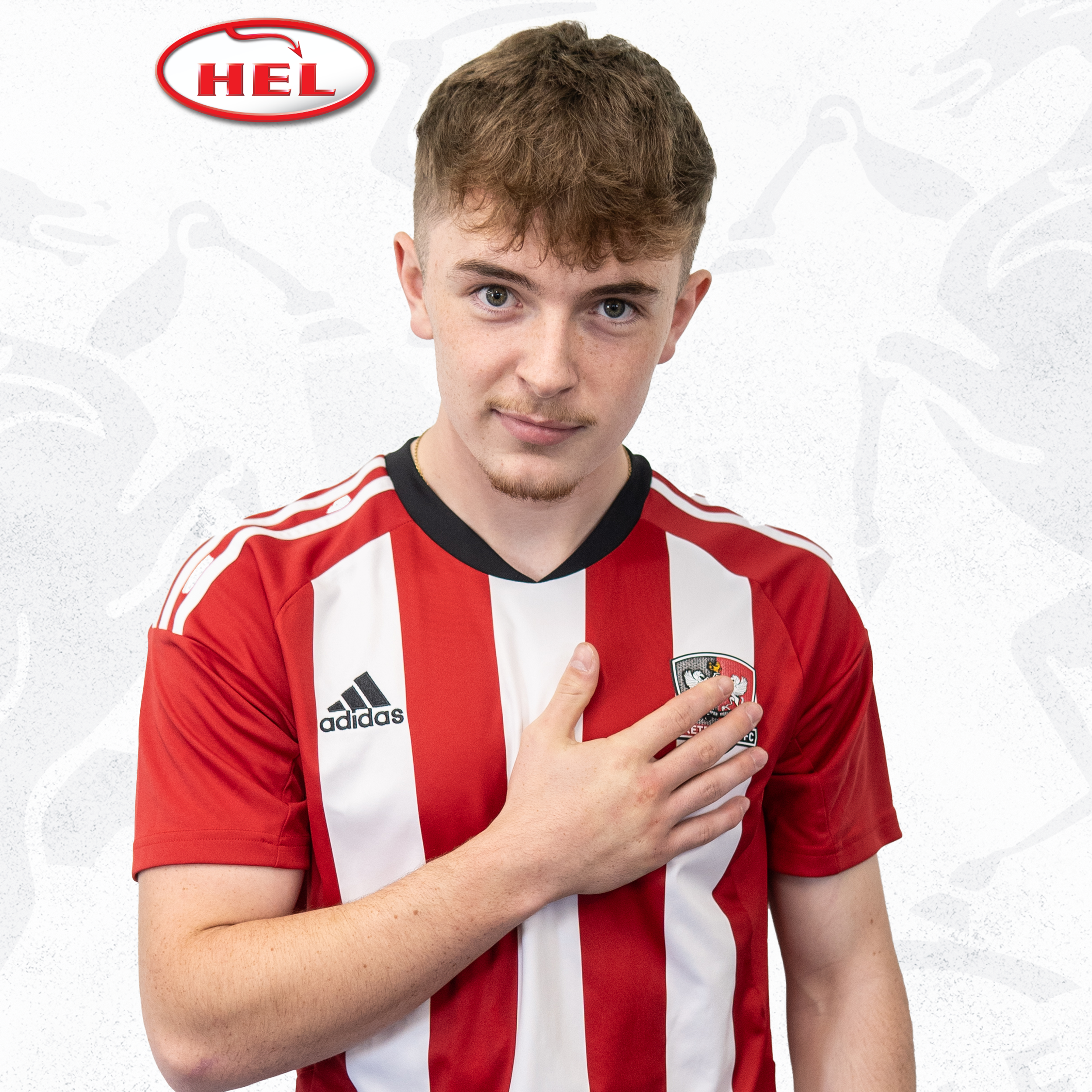 Profile picture of Key Cooper. He's in his red and white home shirt and has his hand on the Exeter City badge, while standing centrally and watching the camera. He has some short facial hair on his chin and a brown short fringe.