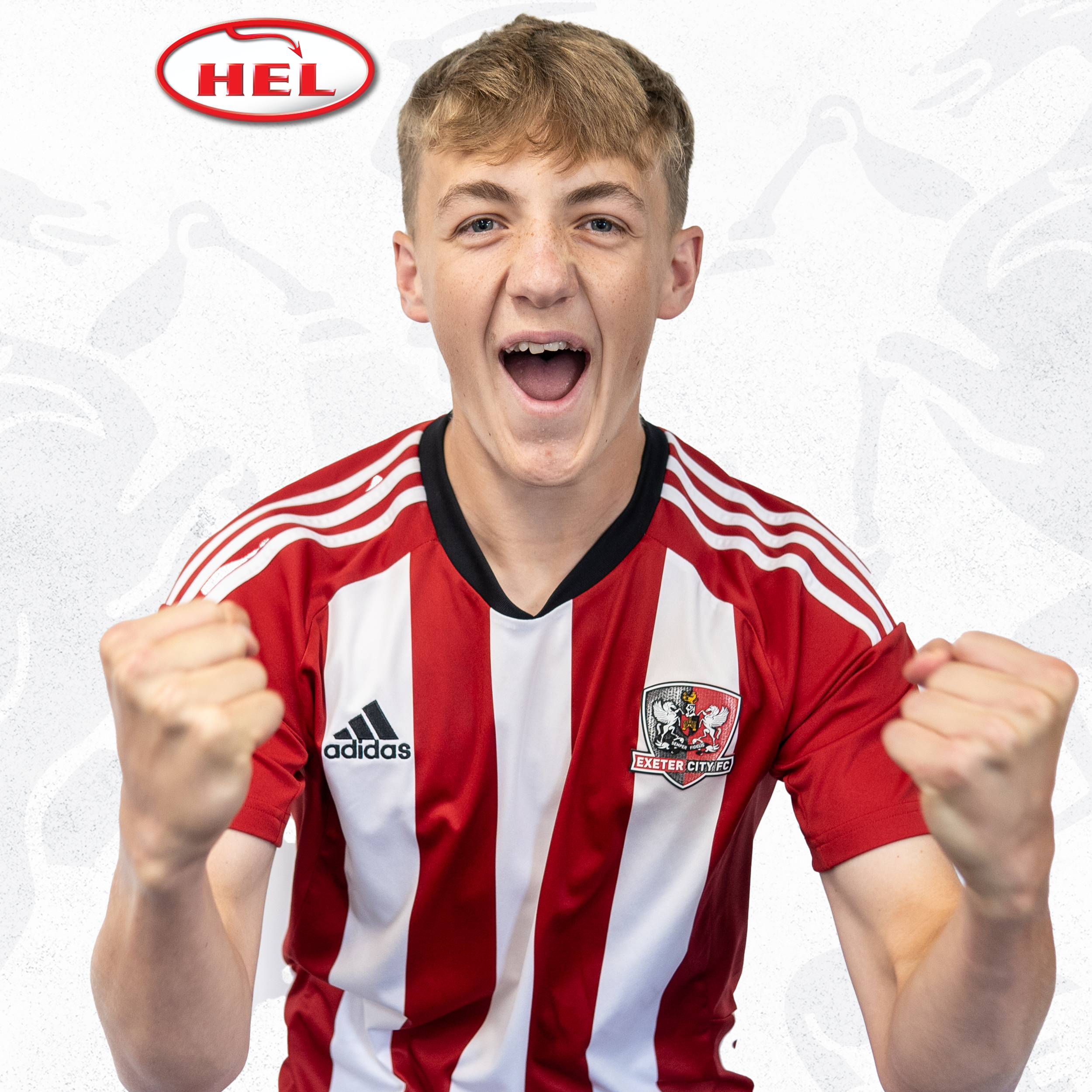 Liam Cartwright profile picture. He's in his red and white home kit, and has balled his fits in celebration at the camera. He's got a blonde short fringe and the HEL logo is in the corner.