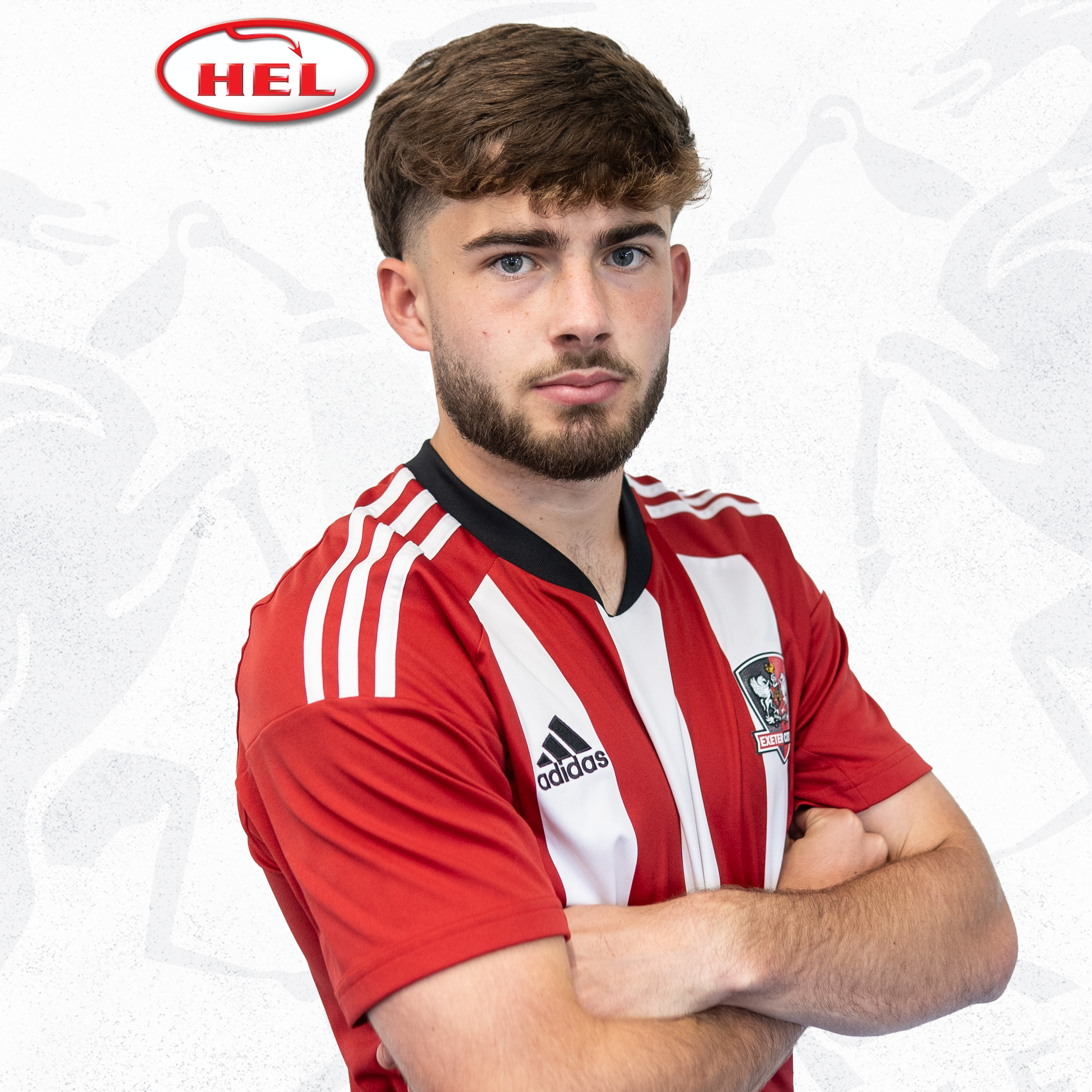 Profile picture for Theo Cutler. He's standing side on, with his arms folded, looking at the camera. He's got a dark fringe, and a brown beard.