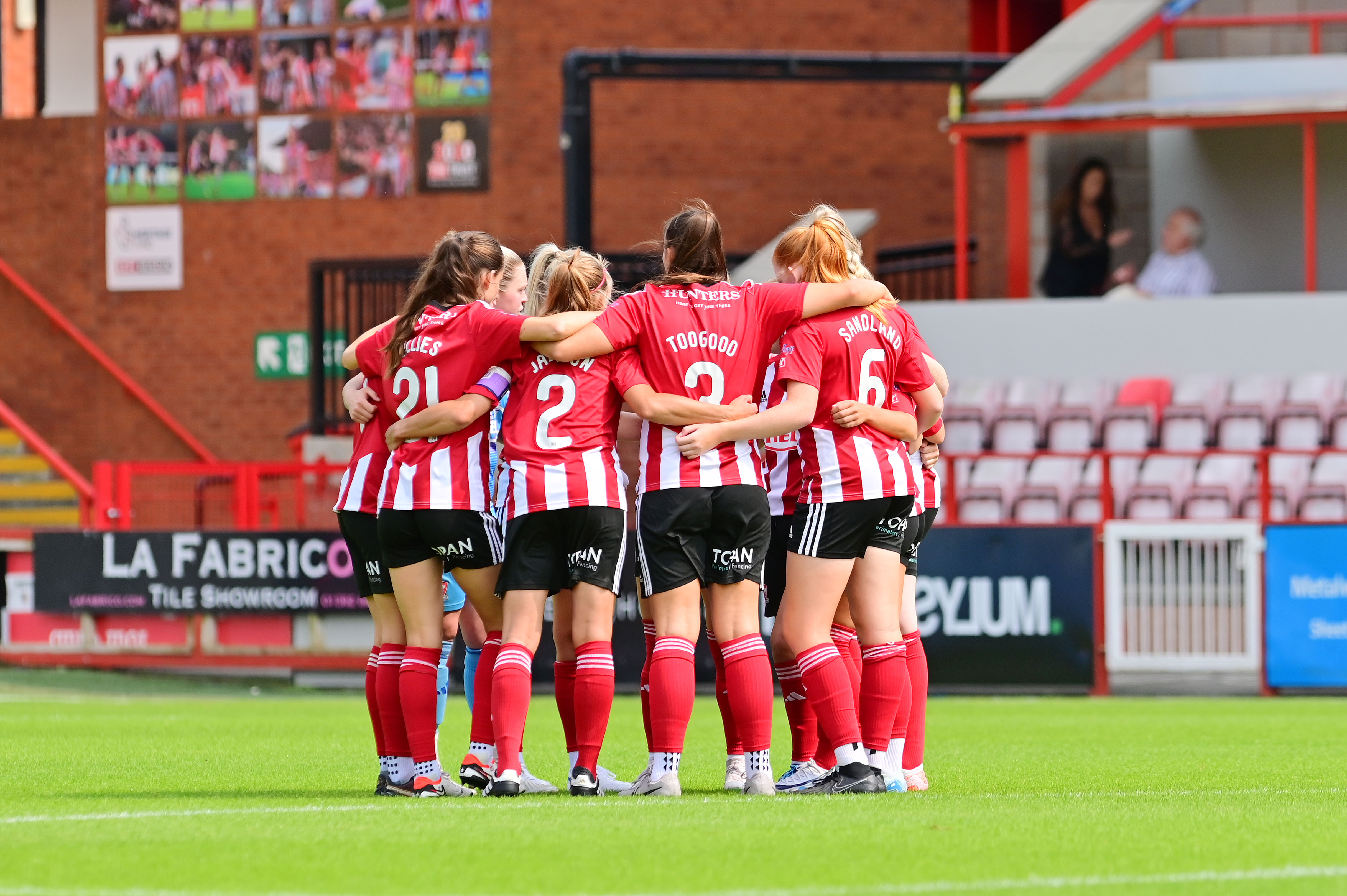 Women's Team Huddle