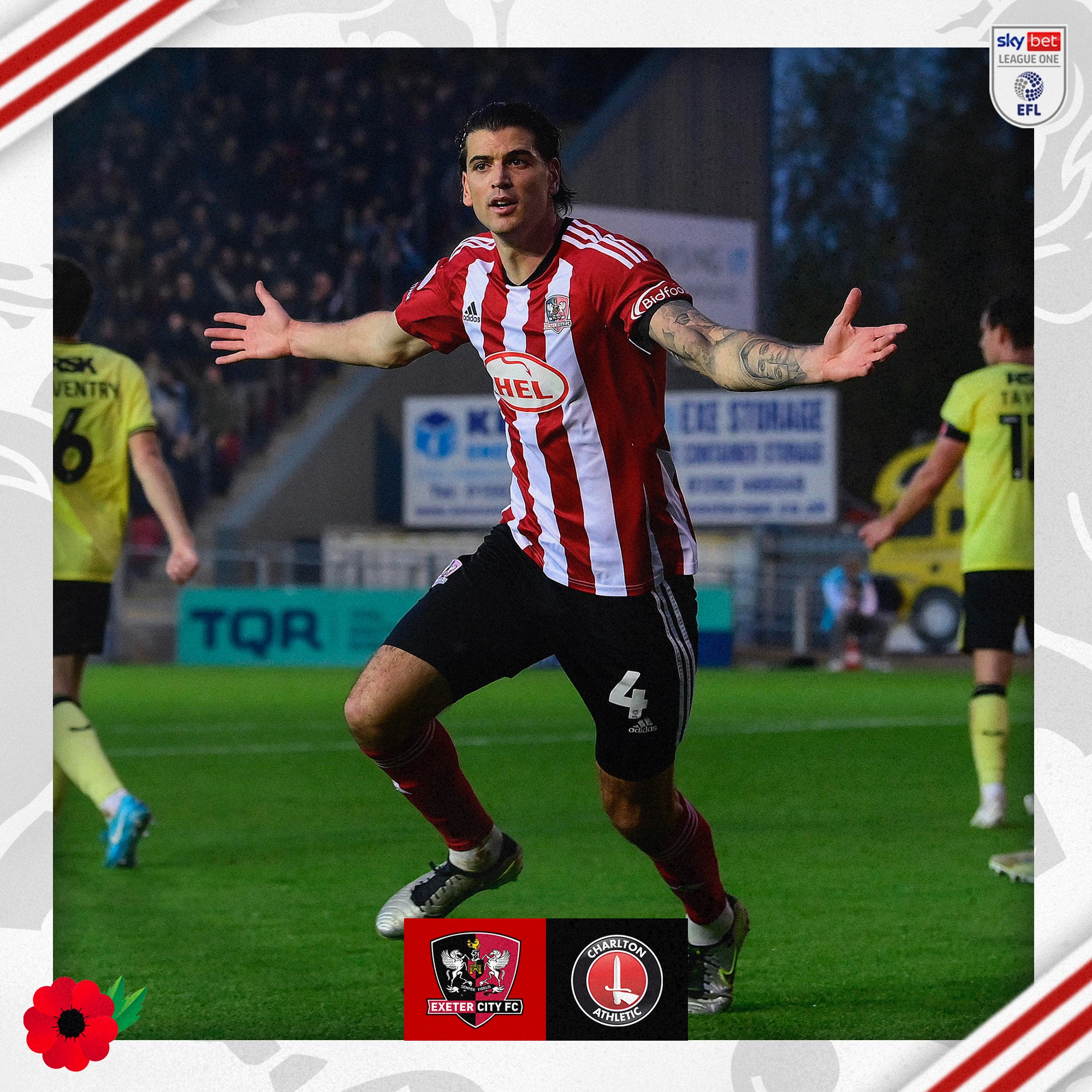 Tristan Crama, in his red and white home kit, running to celebrate his goal with his arms raised to either side.