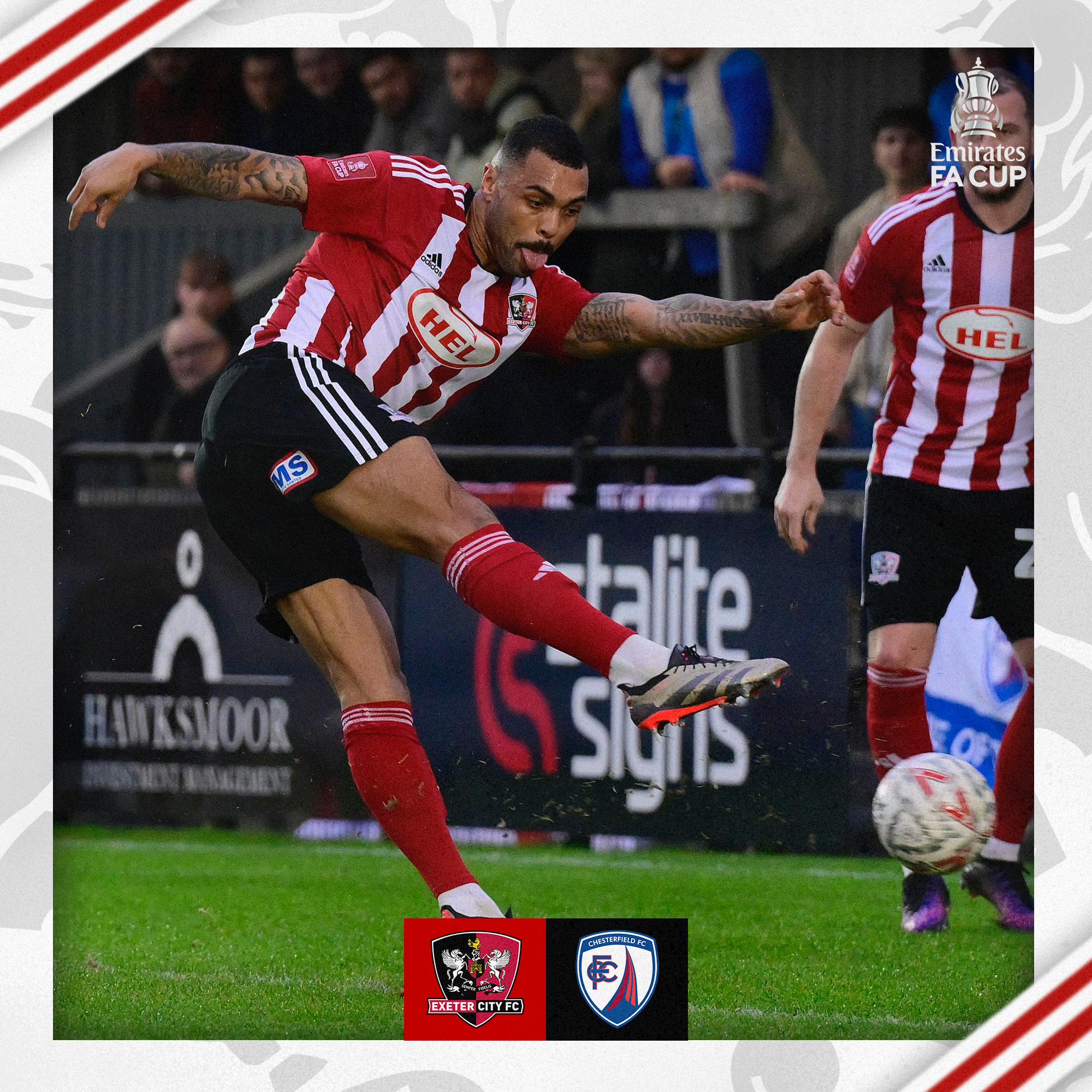 Josh Magennis shooting for Exeter City, with his tongue out.