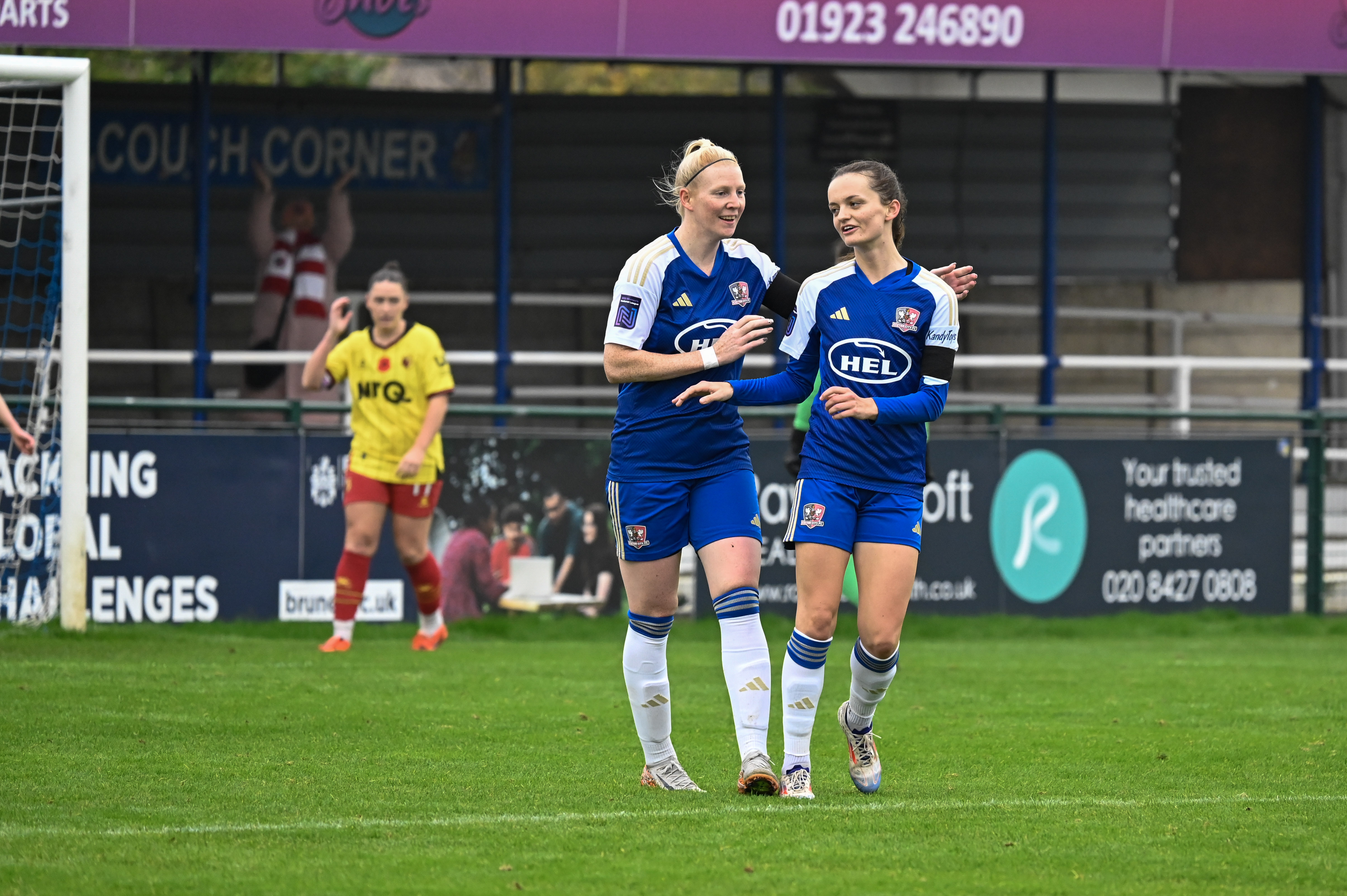 Sophie Gillies celebrates scoring against Watford alongside Sarah Stacey