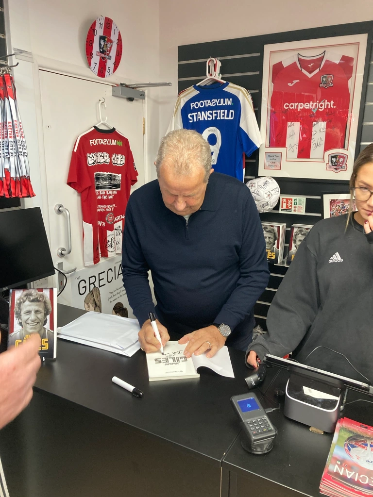 Jimmy Giles signing books