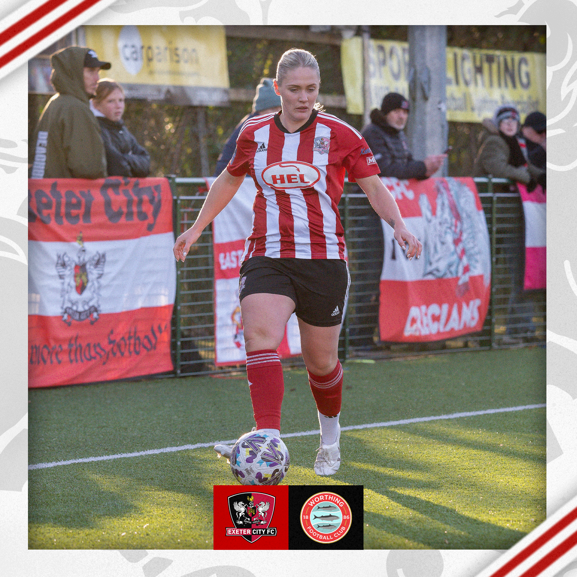 Mollie Taylor, in her red and white home kit, running with the ball.