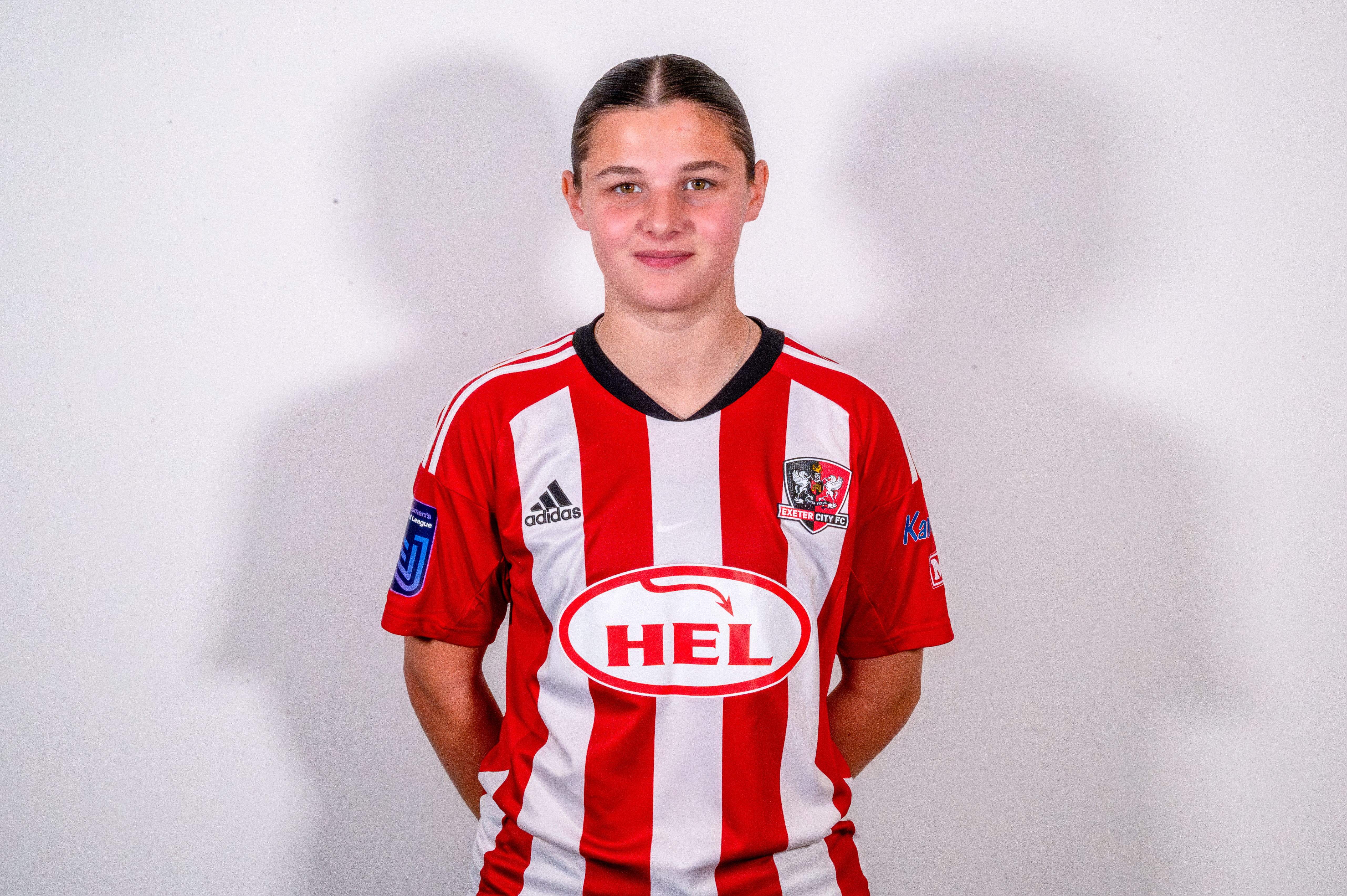 Profile picture of Fearne Slocombe, in her red and white home kit.