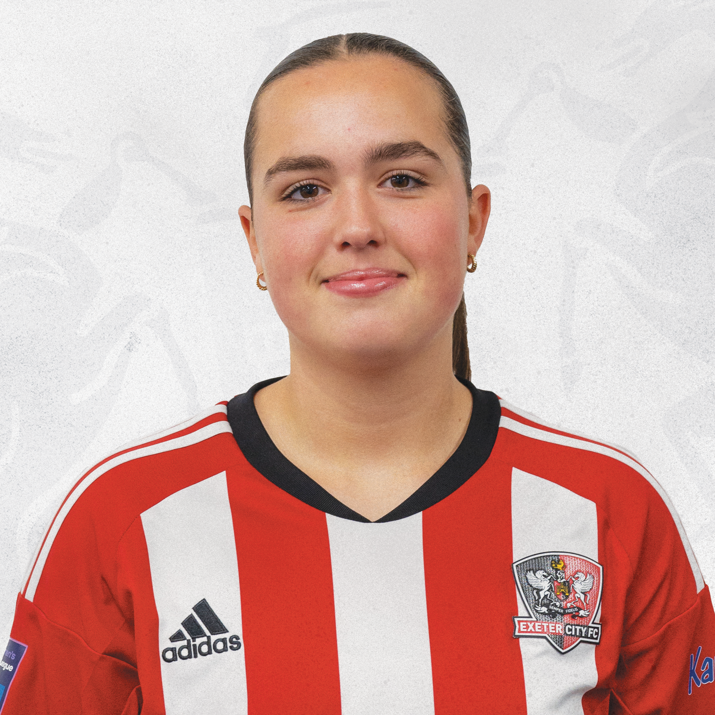 Jasmine Barker profile picture in her red and white home shirt