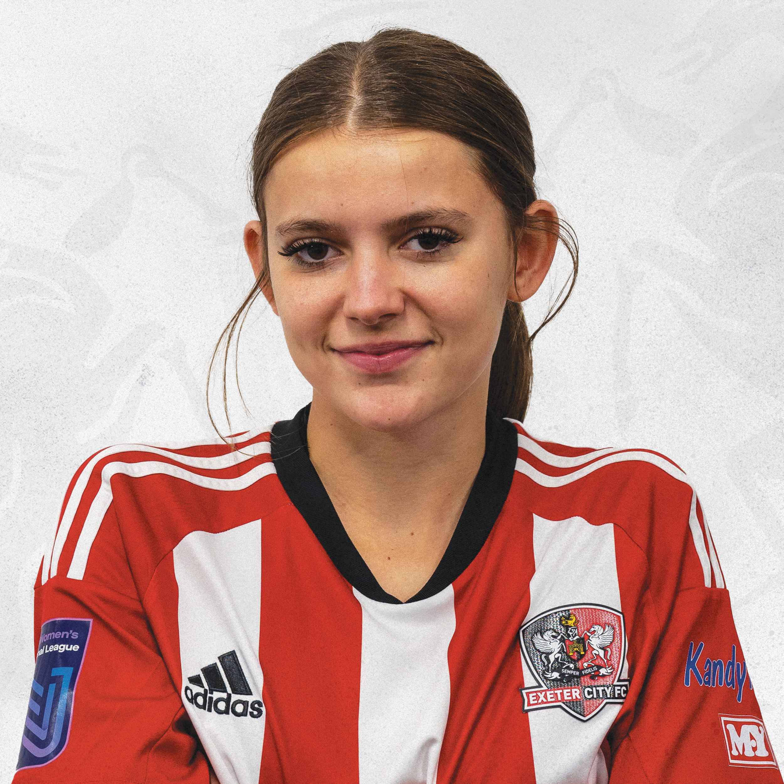 Kiera Harvey, in her red and white home shirt, head shot