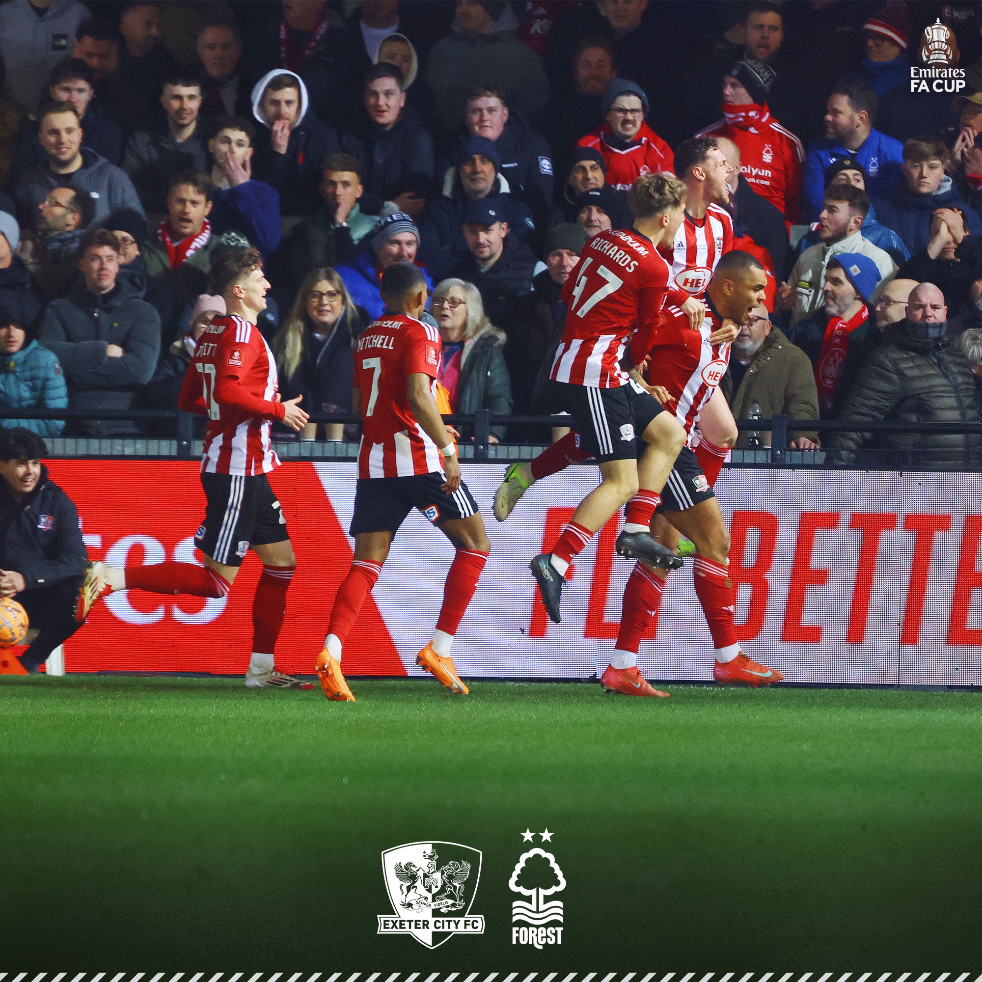 Group of City players celebrating Josh Magennis's opener.