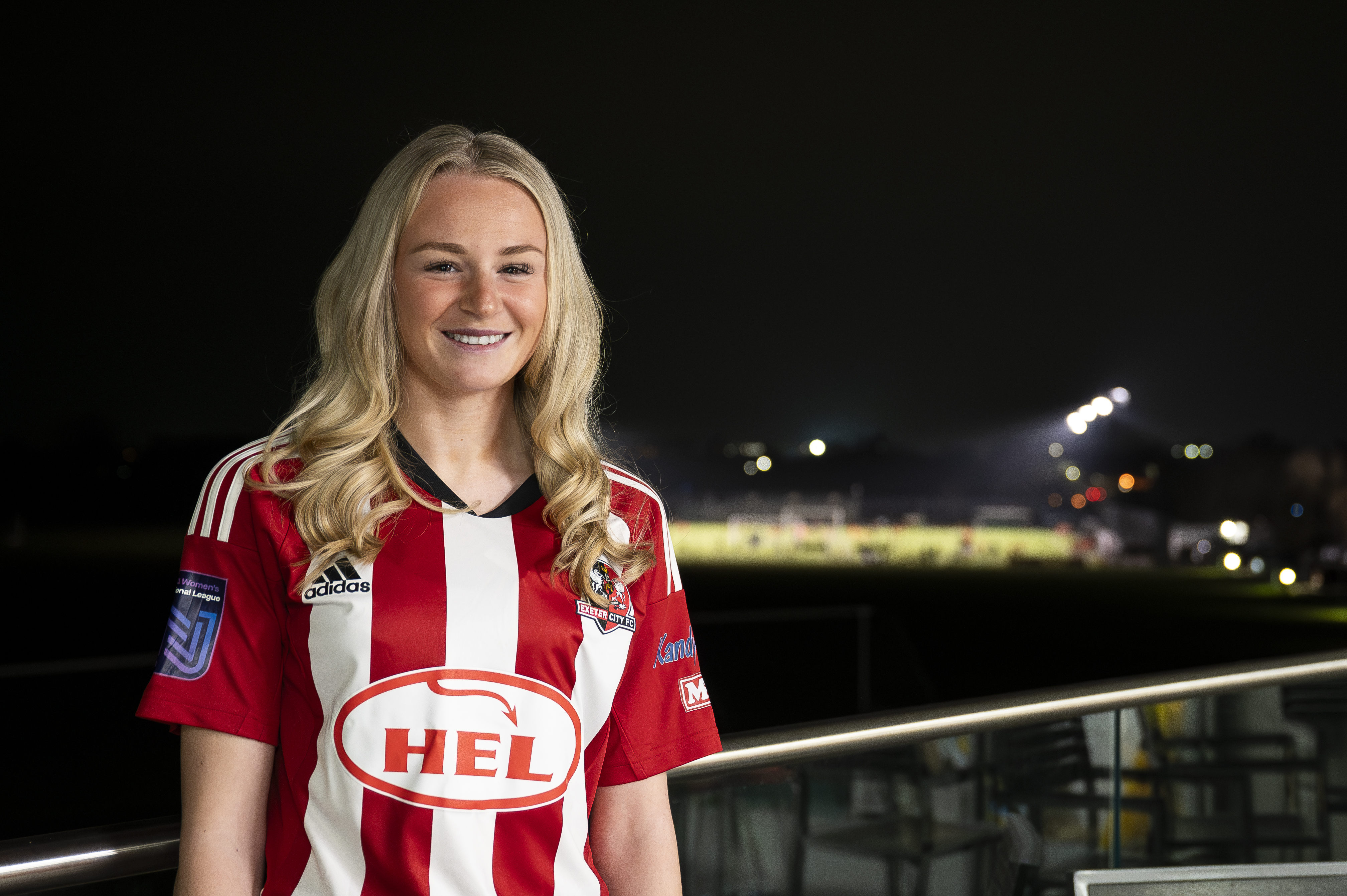 Image of Beth Everson, with the Cliff Hill training ground in the background