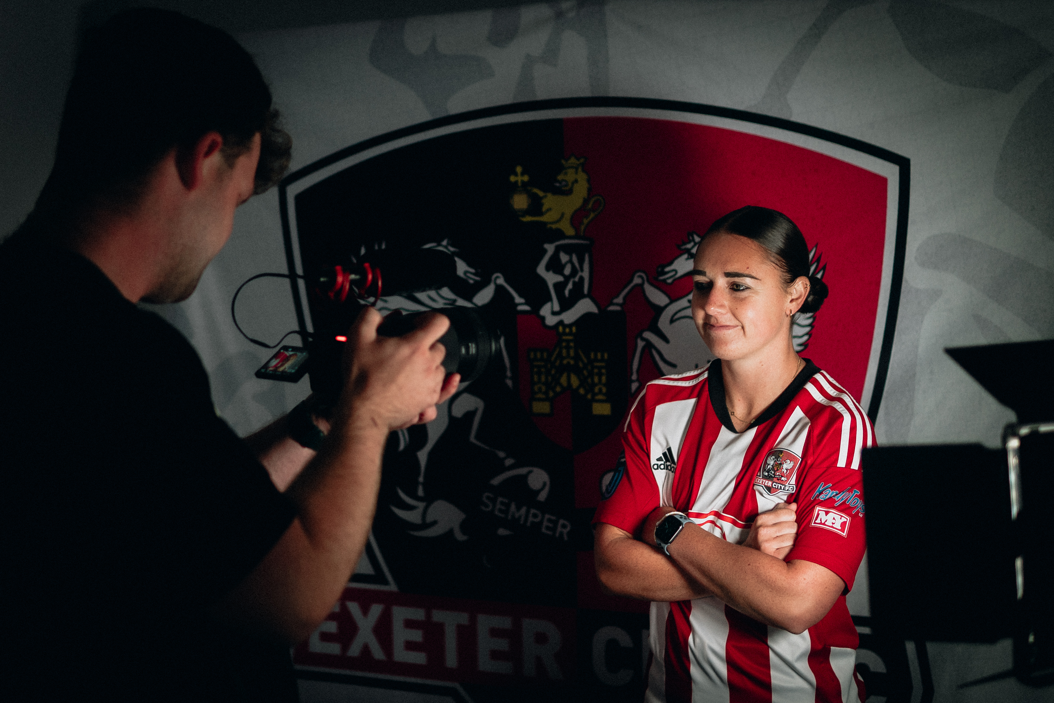 Leah Burridge smiling down the camera