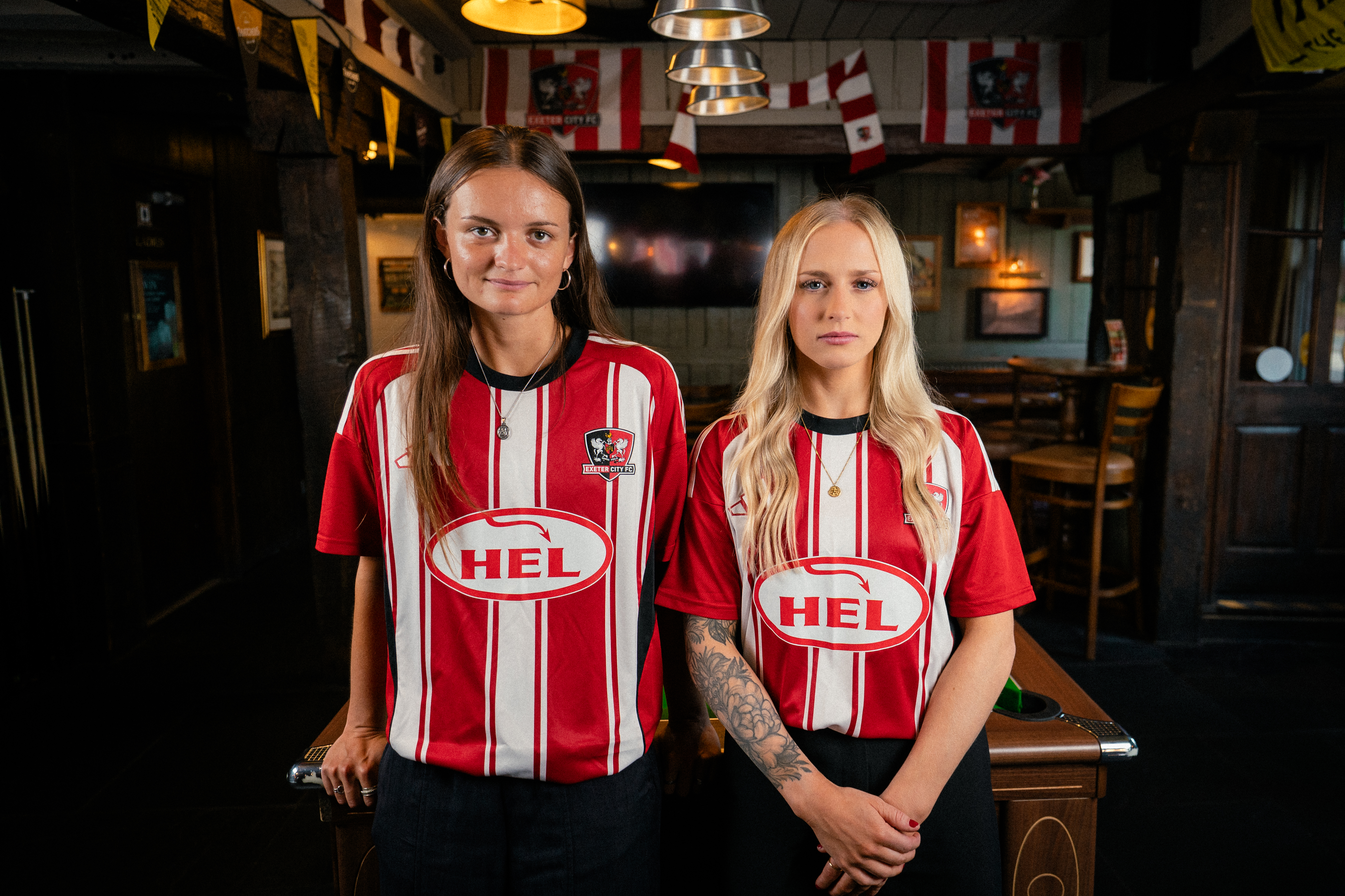 Sophie Gillies and Amber Pollock rocking the 2025/26 City home shirt