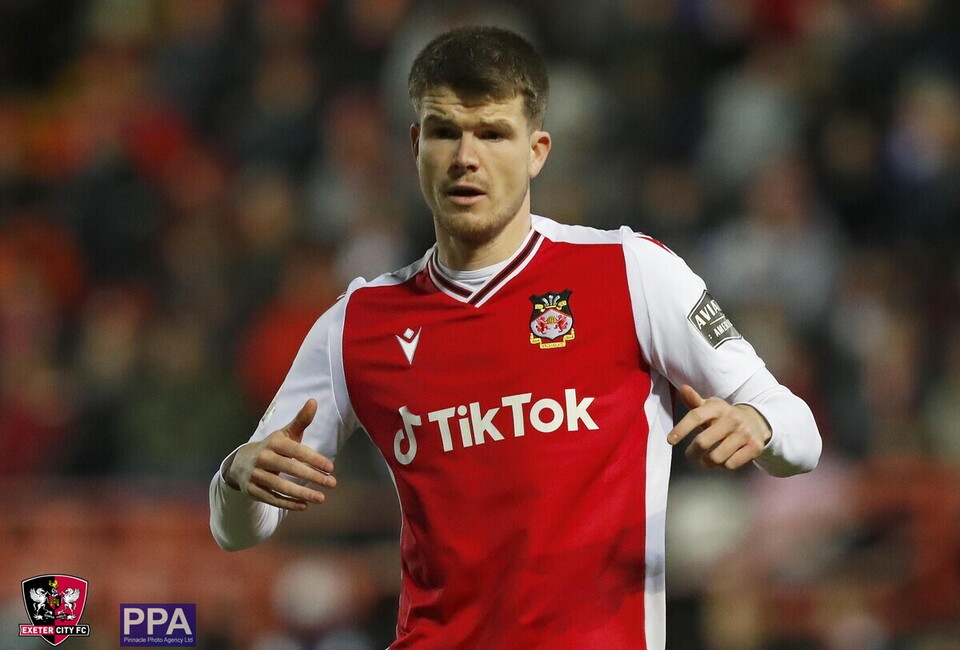 Liam McAlinden in a Wrexham home shirt