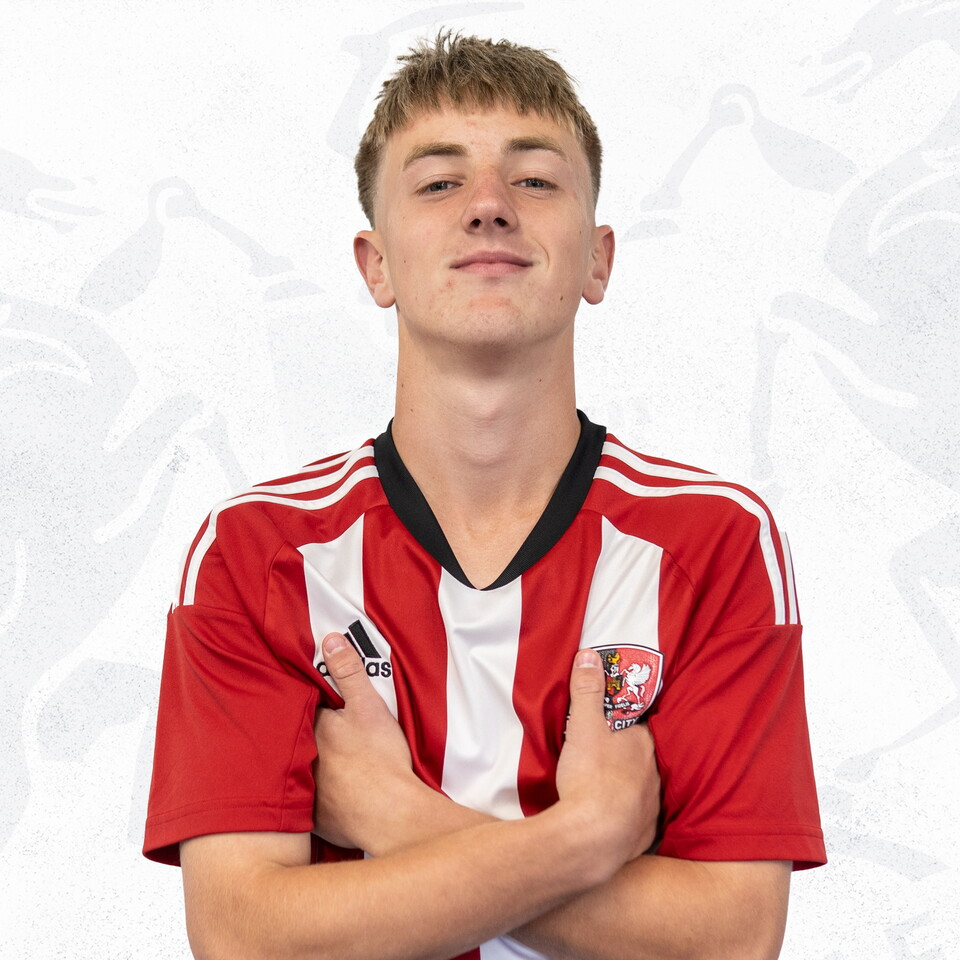 Profile picture of Callum Graham with his arms crossed, wearing his red and white home kit. He's blonde with a slight smile looking down the camera.