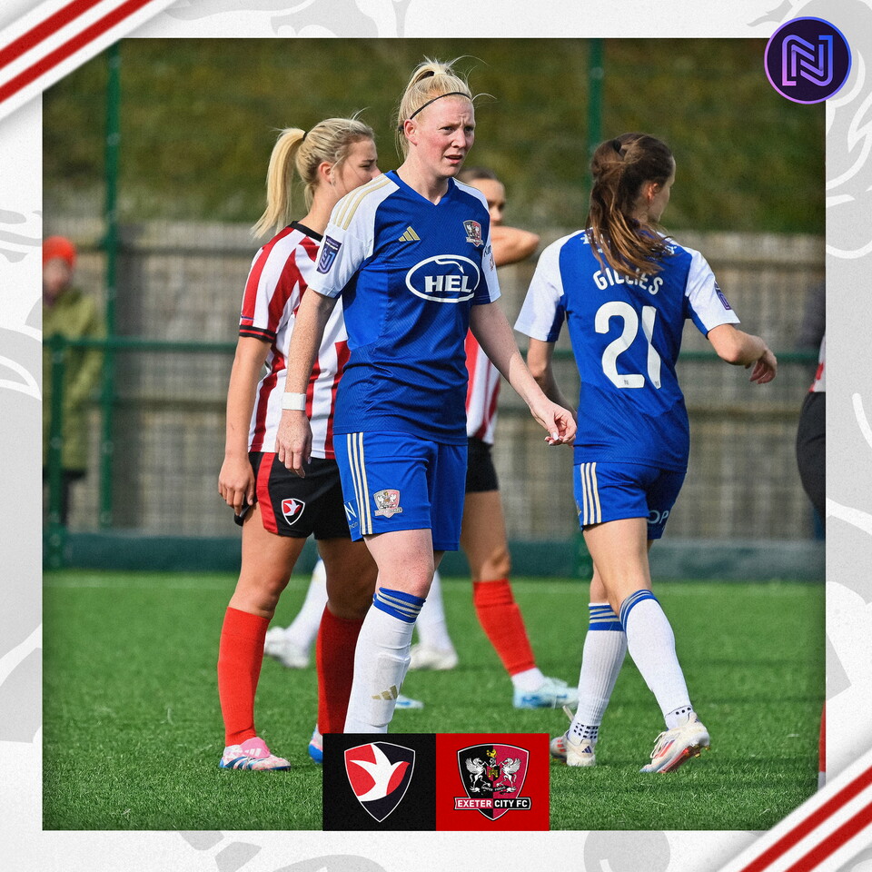 Sarah Stacey on her 150th Exeter City appearance. She's in her blue and white away kit walking away from a defender.