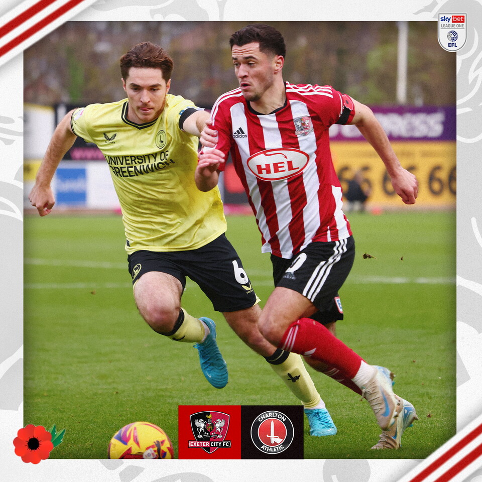 Jack Aitchison, in his red and white home kit, running with the ball away from a Charlton player.