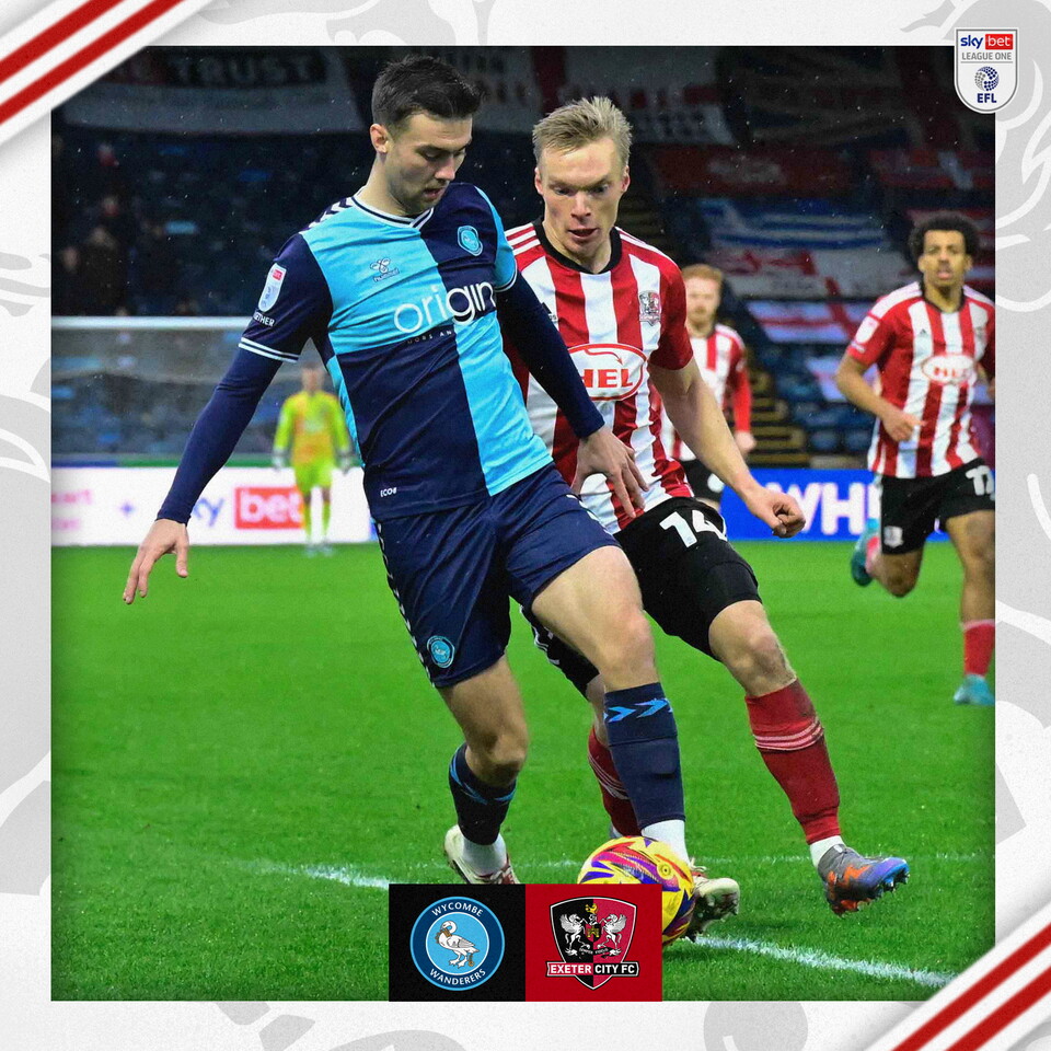 Ilmari Niskanen closing down a Wycombe player on the ball