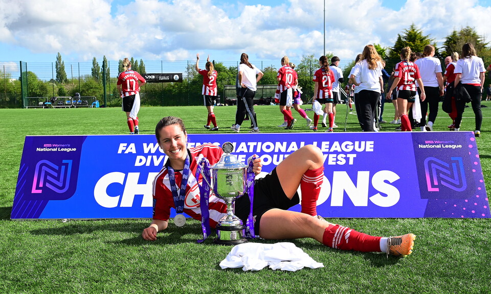 Zoe Watkins of Exeter City Women at The Exwick Sports Hub with the league trophy.