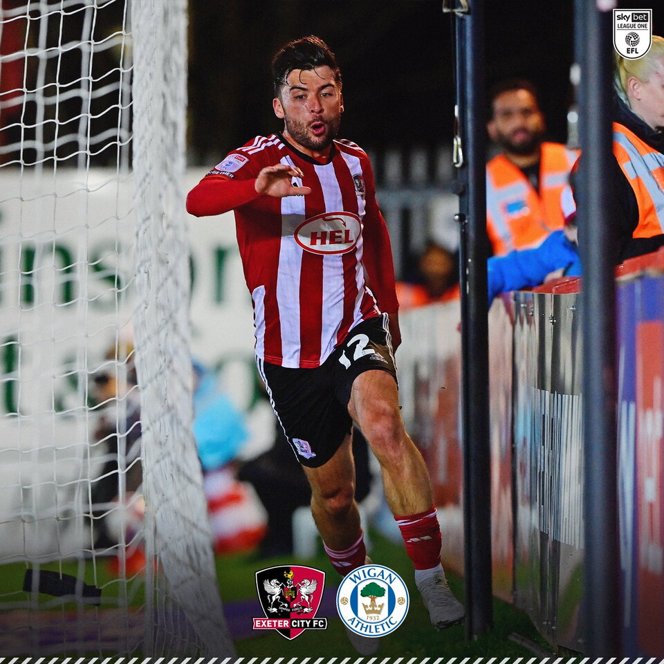 Reece Cole celebrating his goal against Wigan