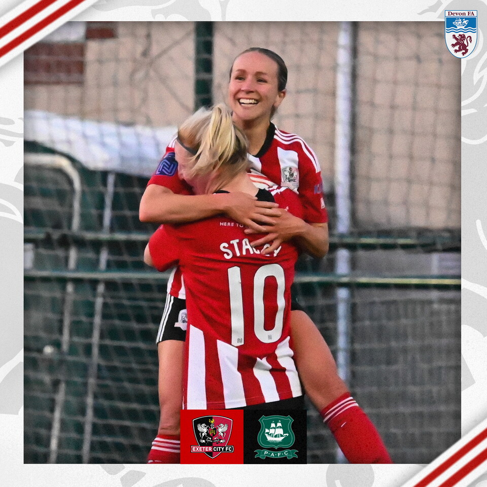 Ishbel zuurmond being held high by Sarah Stacey, celebrating her goal