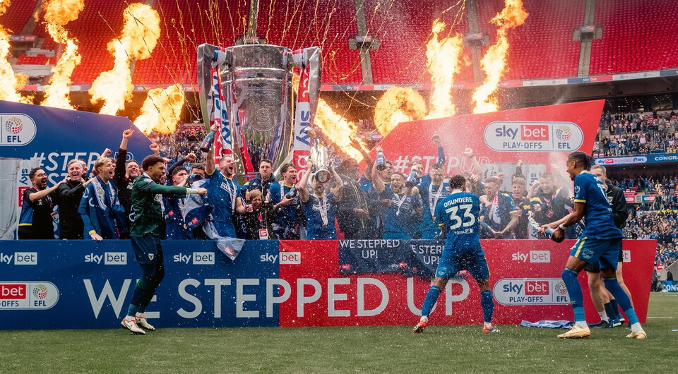 Wimbledon celebrate promotion