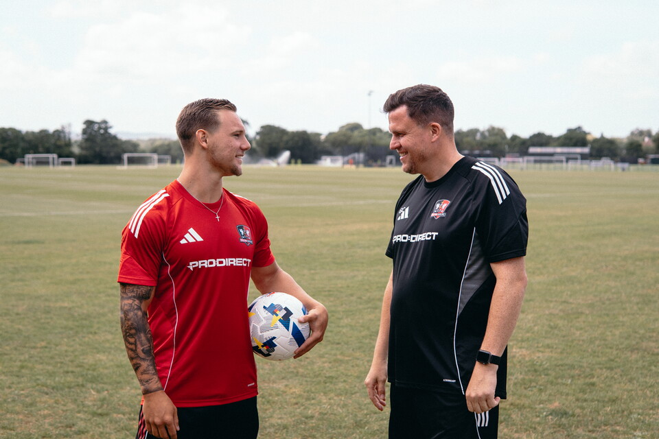 Gary and Jayden Wareham laughing at the Cliff Hill training ground