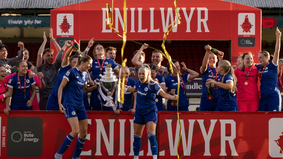 Cardiff City women lifting the cup trophy