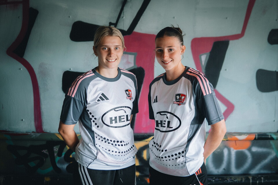 Beth Ireland and Georgia Vaccaro in their Exeter City third shirt