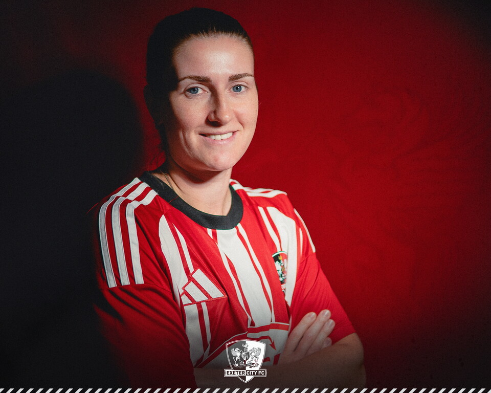 Image of Georgina Presswell smiling with her arms folded towards the camera