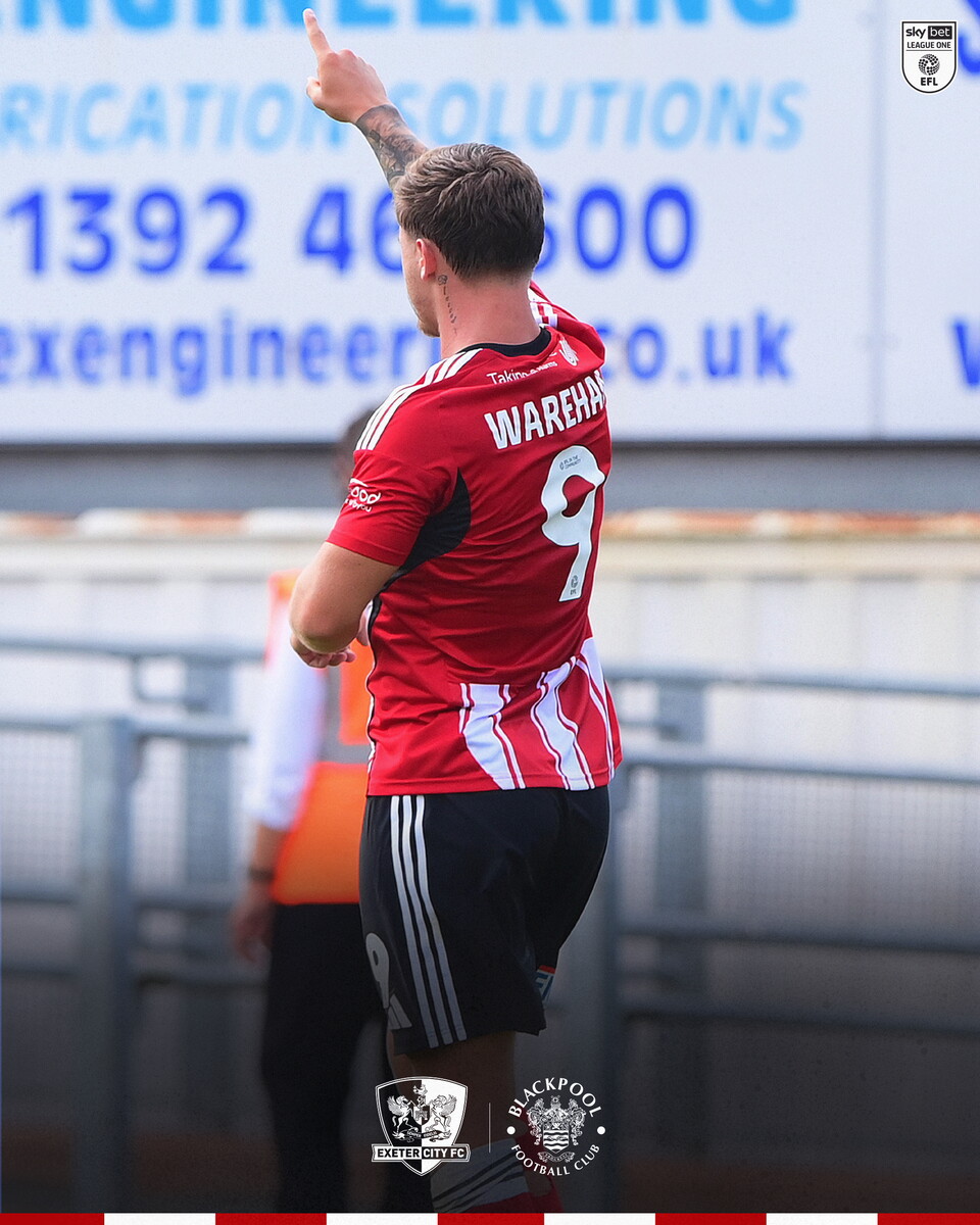 Image of Jayden Wareham turning and pointing at the Adam Stansfield Stand