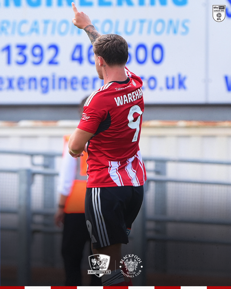 Image of Jayden Wareham turning and pointing at the Adam Stansfield Stand