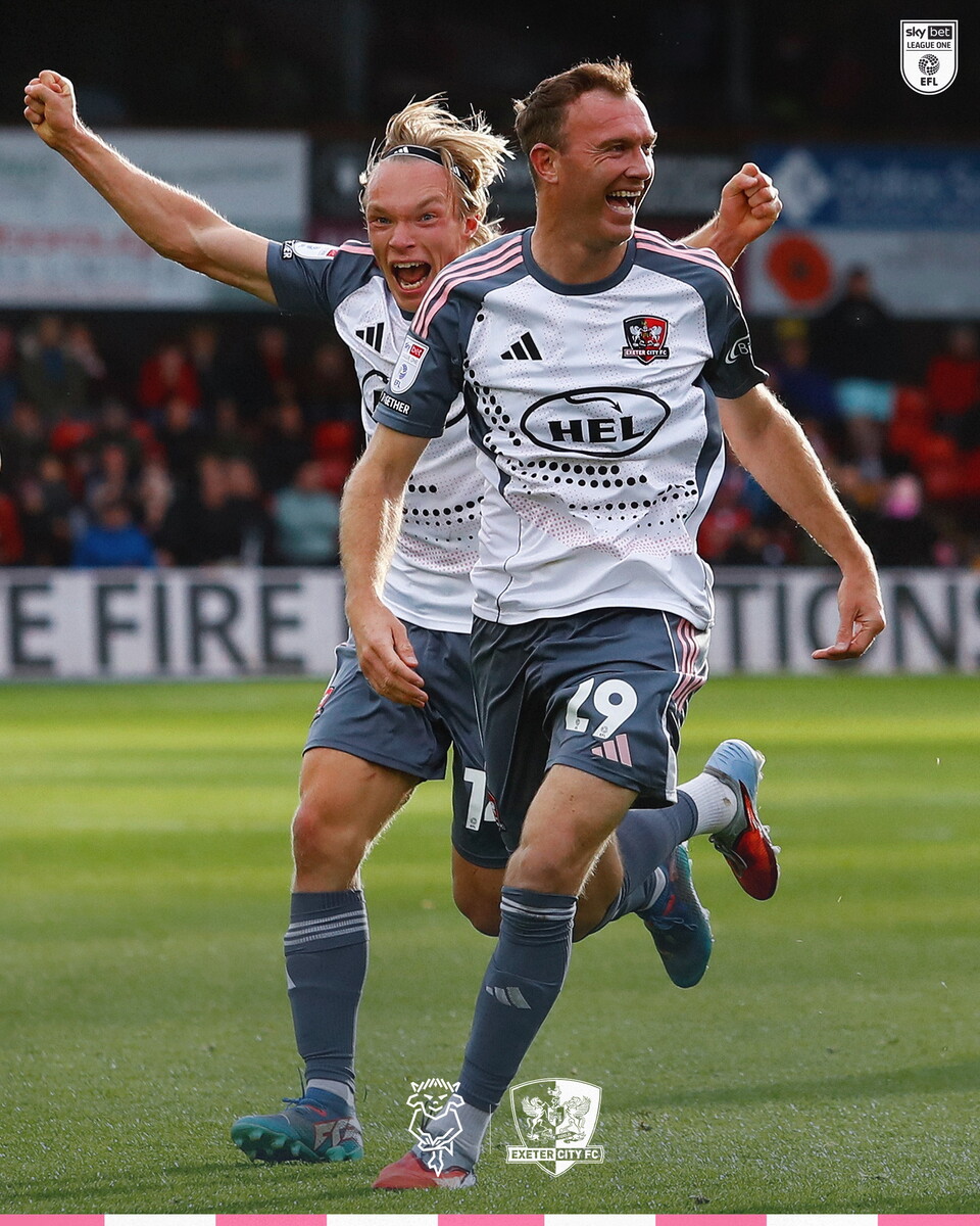 McDonald and Niskanen celebrate City's late winner.