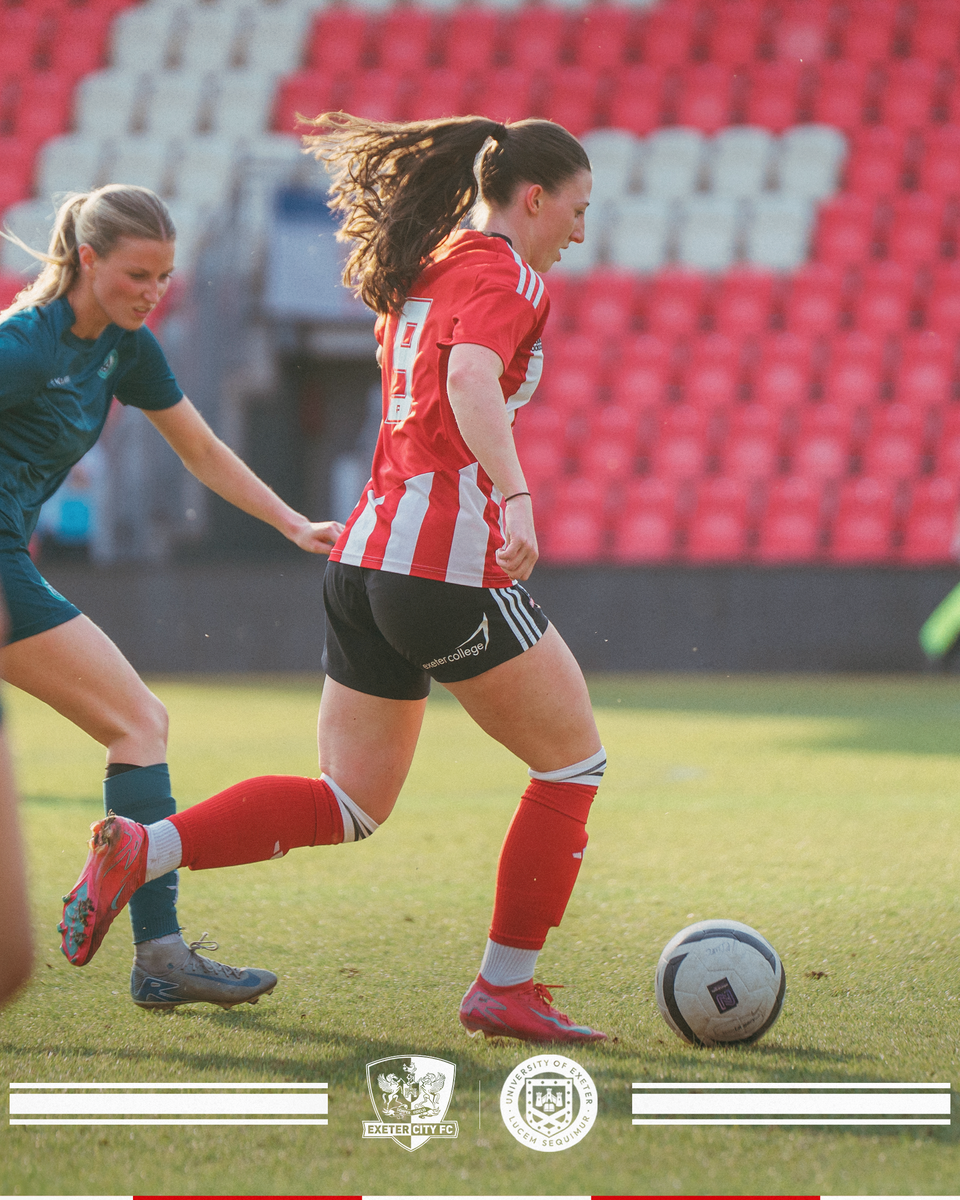Image of Georgia Vaccaro battling on the ball against the University of Exeter