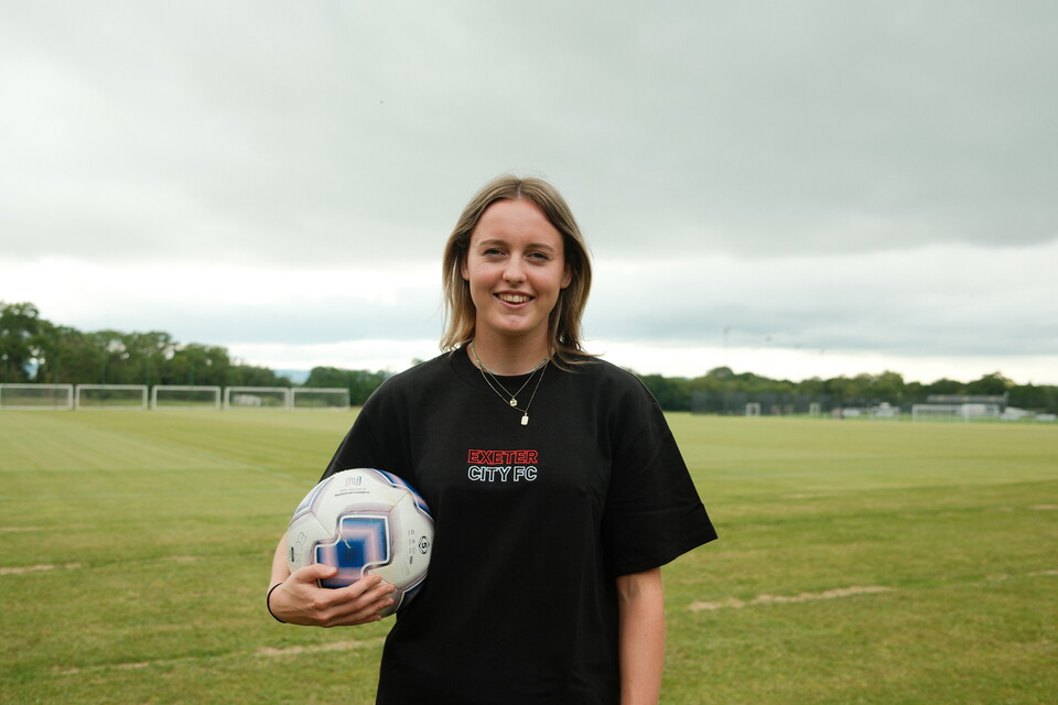 Image of Saskia Heard holding a ball at Exeter City's training ground