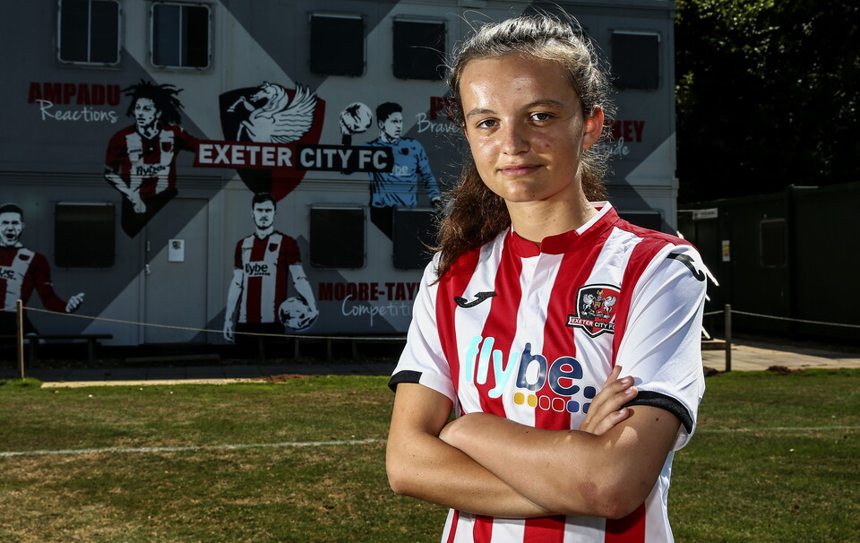 Sophie Gillies at the age of 16 standing in front of the main building at the Cliff Hill Training Ground