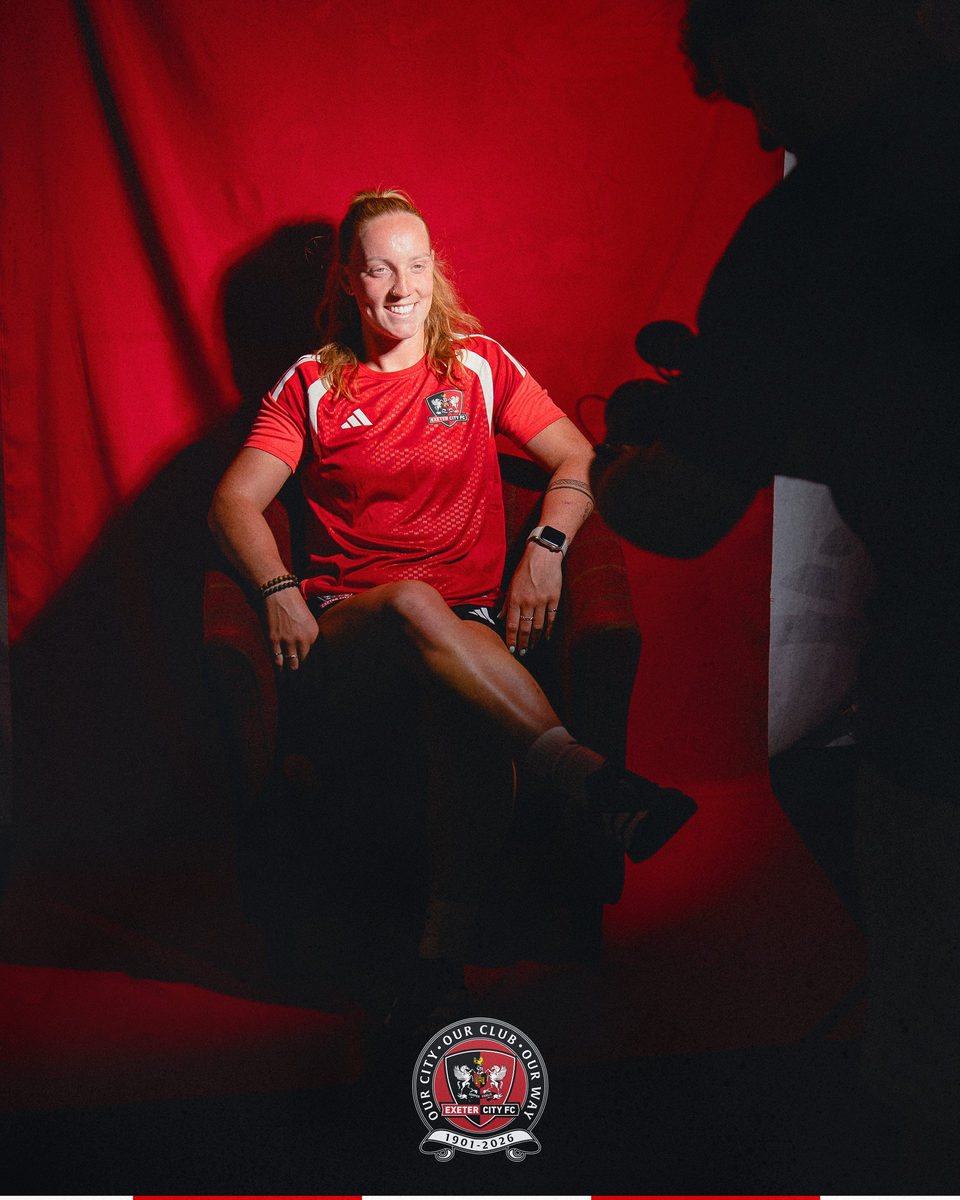 Image of Ffion sat in a chair in Exeter's media room