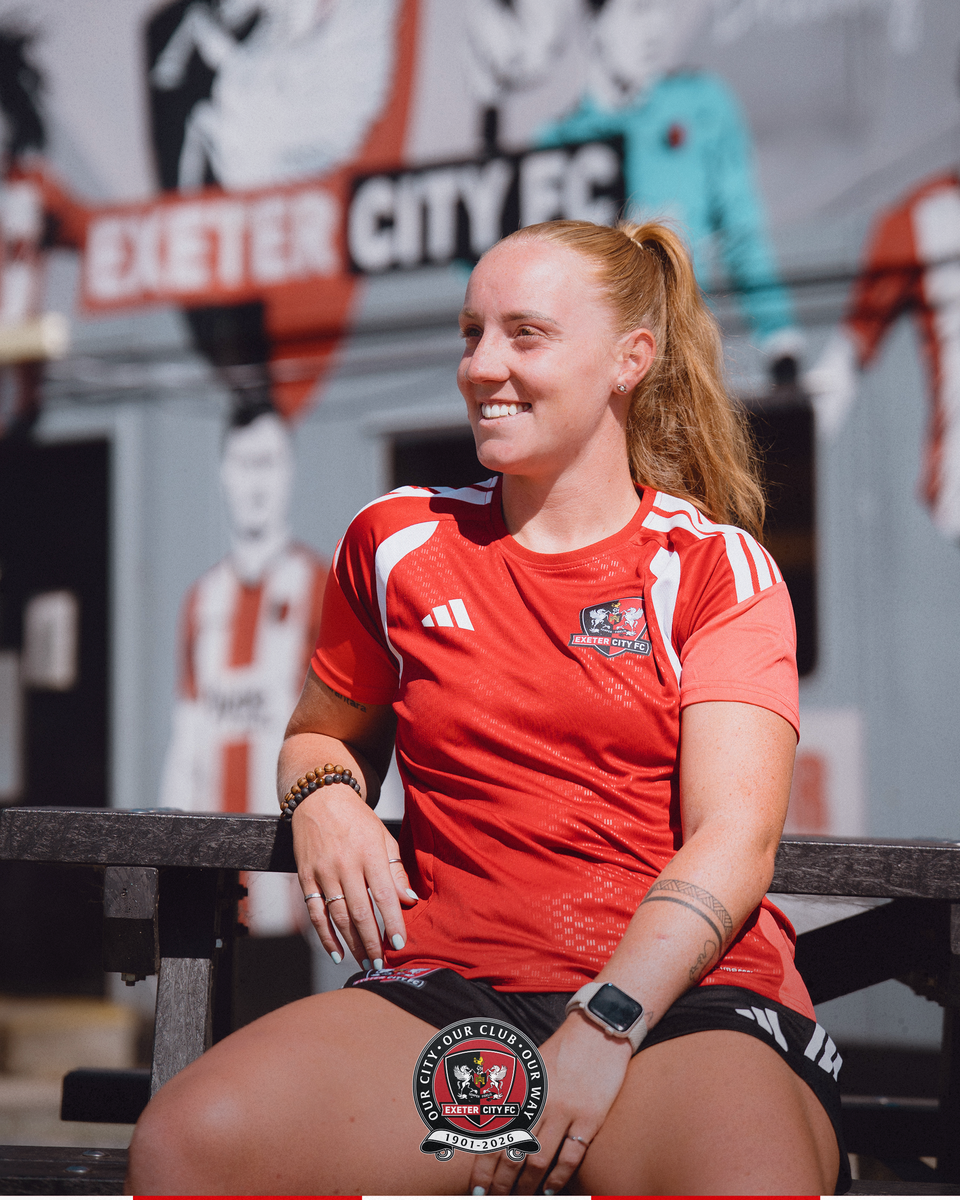 Ffion Lellewlln sat on a bench at the training ground