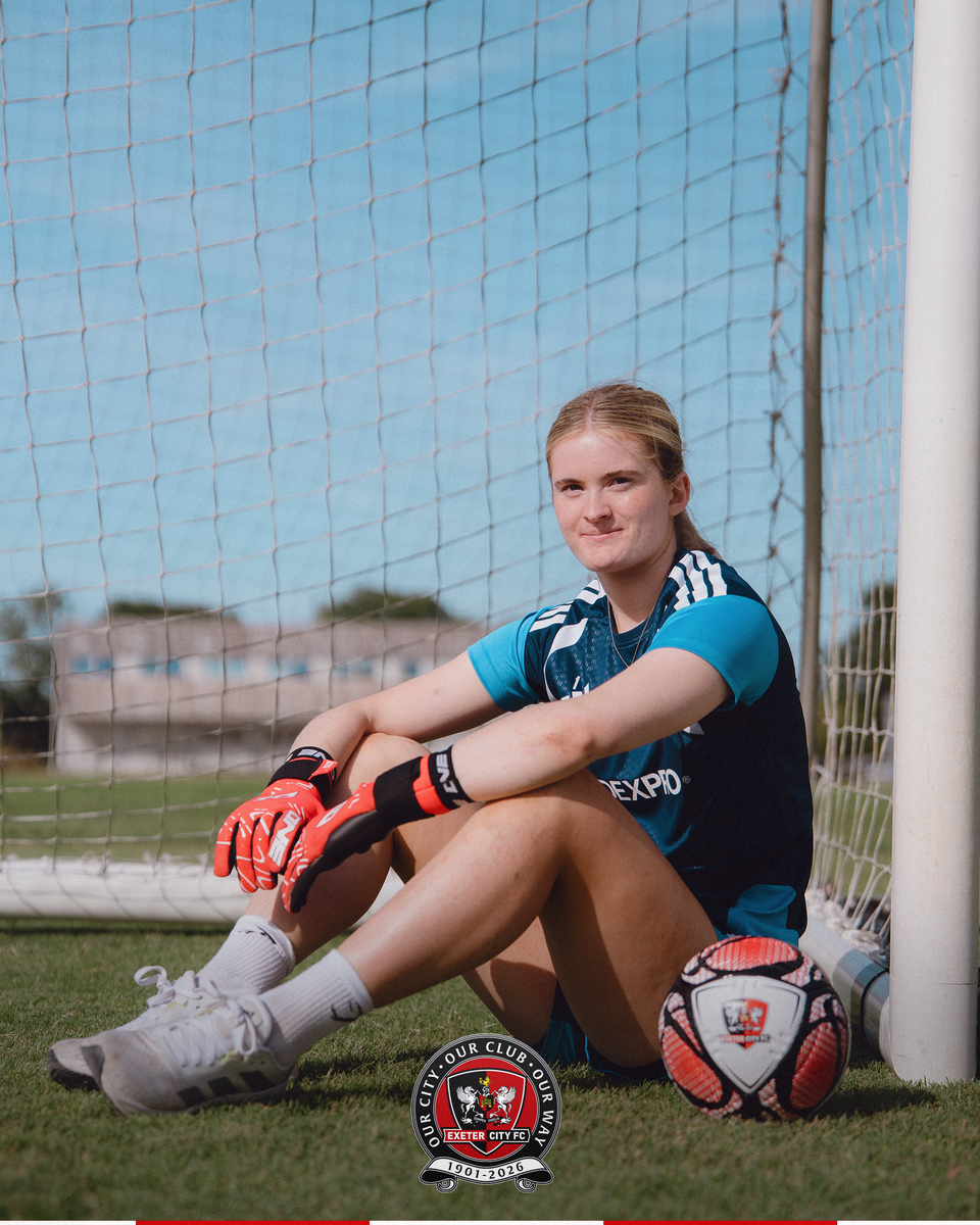 Image of Tyrii Bell sat in the goal at Exeter City
