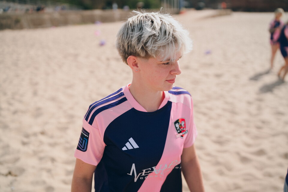 Image of U18 player Grace in the new away kit