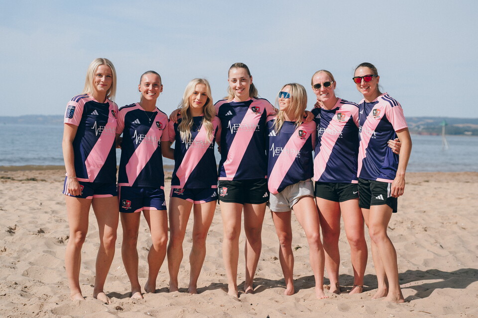 Members of City Women's first team wearing the new kit at the beach