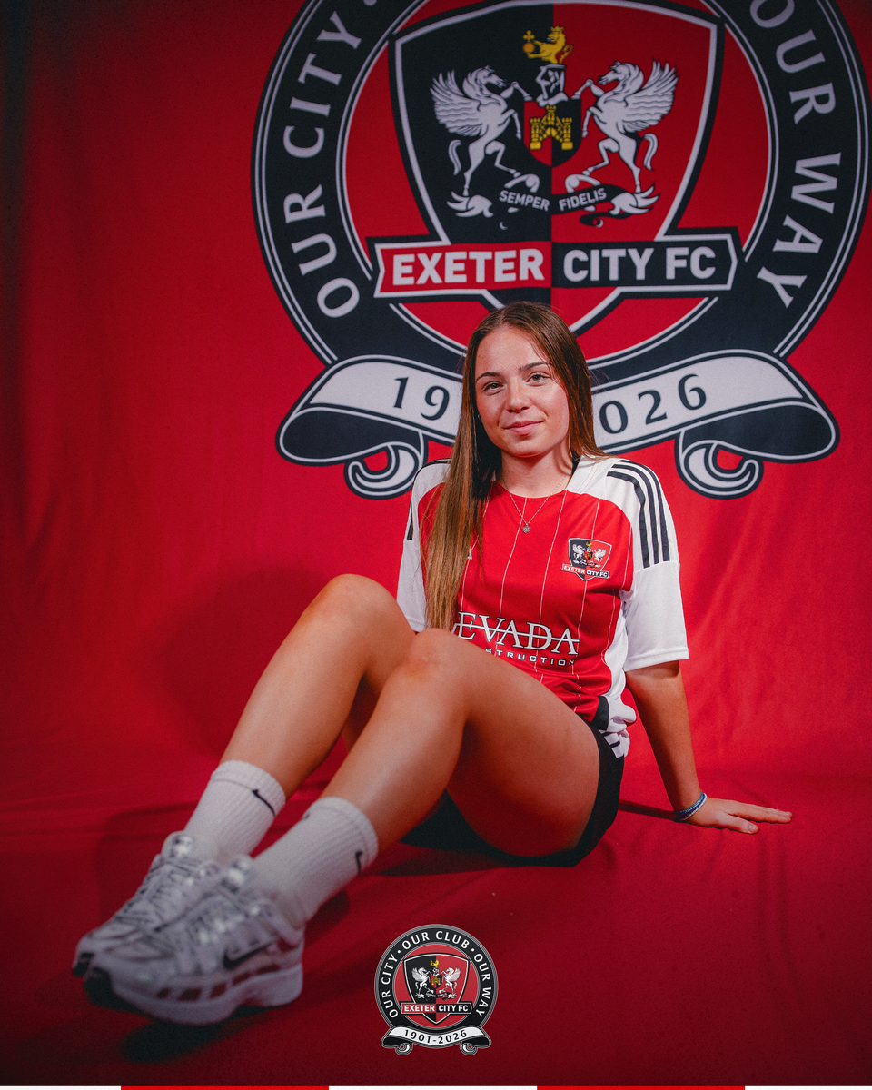 Image of Exeter City Women's new signing, Darcey Maxted, sat down
