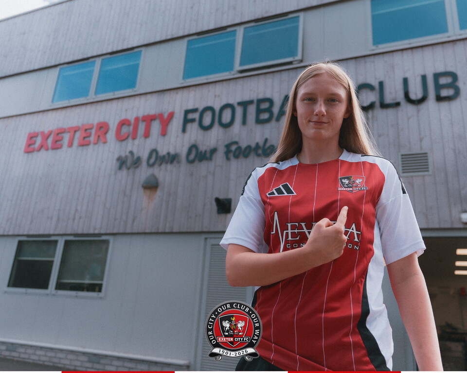 Image of Nia Lewis standing outside the main hub at the Cliff Hill